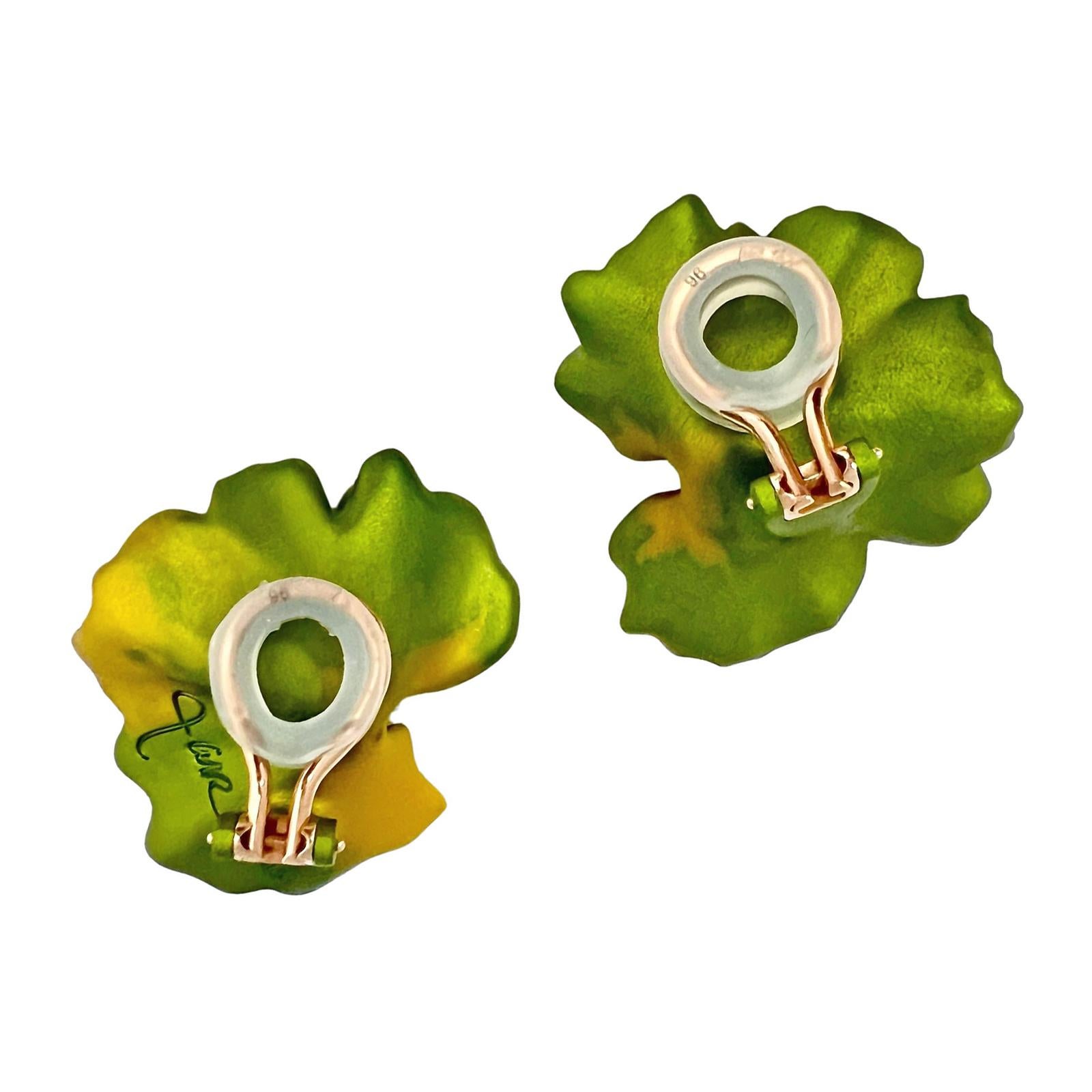 Geranium leaf clip earrings by Joel Arthur Rosenthal (JAR), Paris.  Elegantly designed in gilt aluminum to replicate the sun shining through summer leaves with graduating tones of green and yellowish-green.  Secured by 18k rose gold omega-style clip