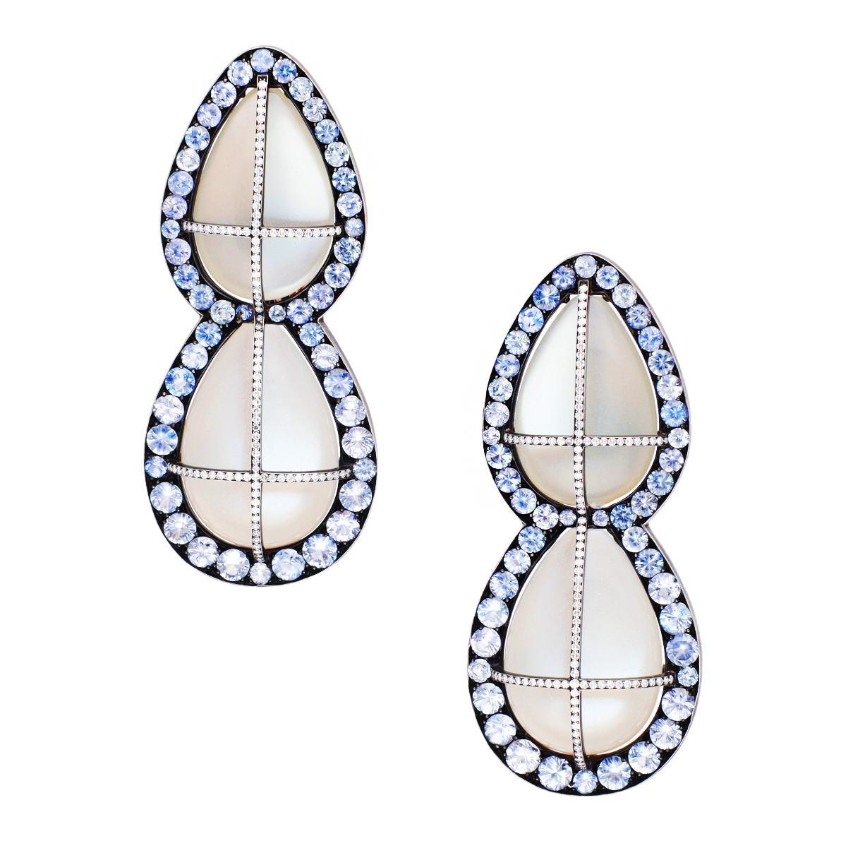 18K Rose Gold and Silver Pear Shaped Cabochon Moonstone, Sapphire, and Diamonds.
Approximate Length - 2.4