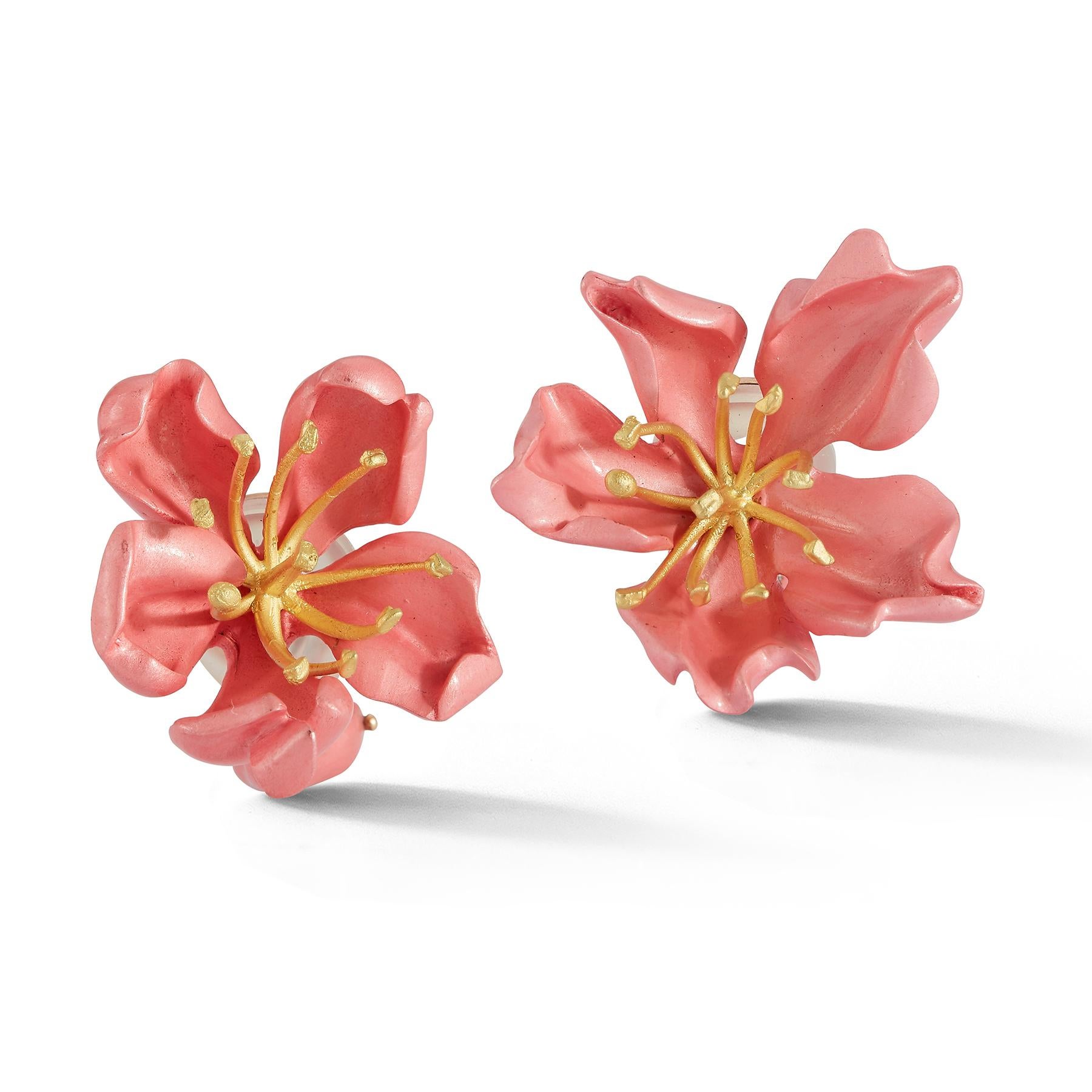 Pink Enamel Almond Blossom Earrings by JAR

A pair of 18 karat yellow gold and silver flower earrings with pink enamel pedals

Signed JAR Paris and numbered

Accompanied by original pouch

Length: 1.25
