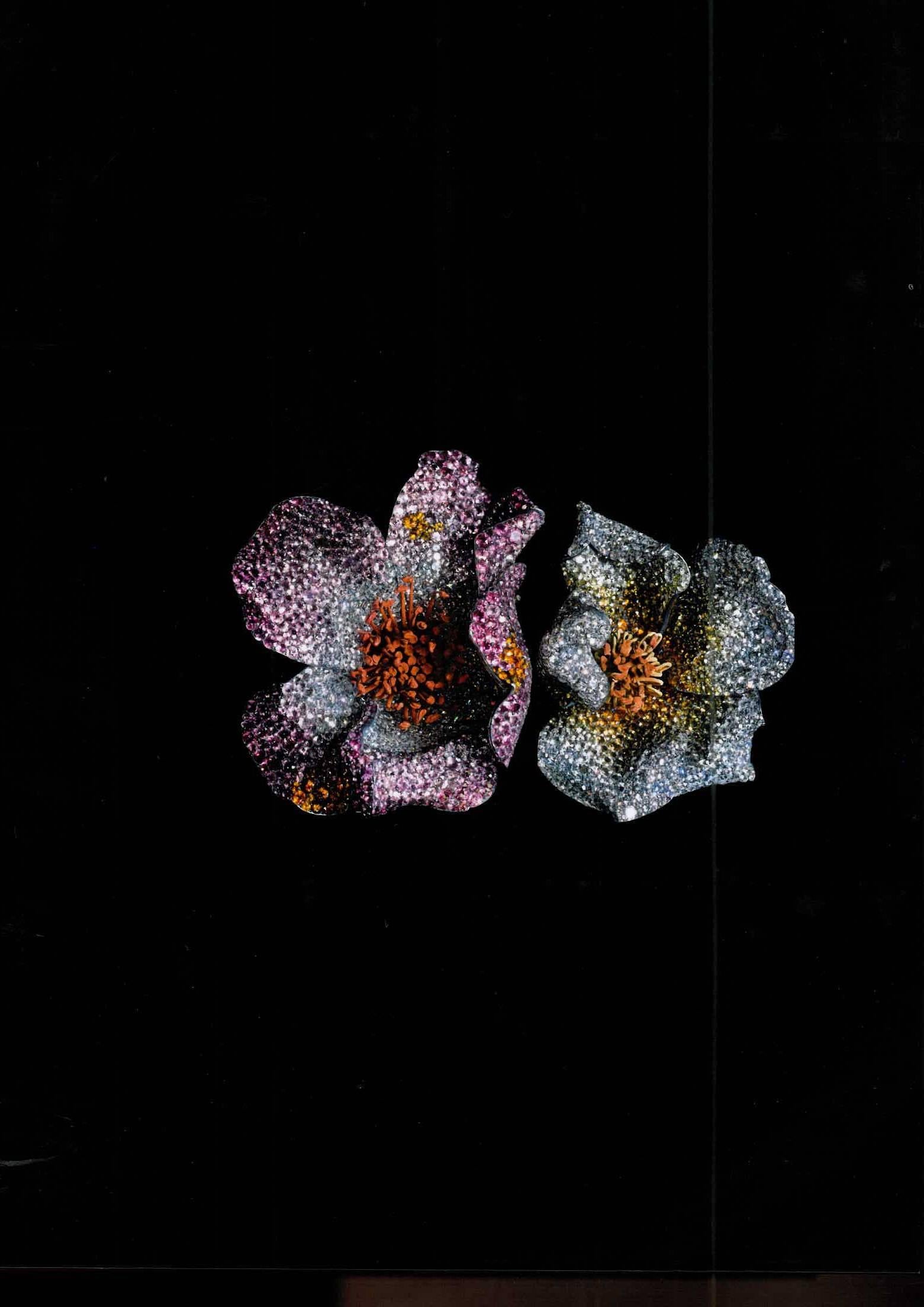 This beautiful book is the 2013 reprint of an original from 2002, which was produced to coincide with an exhibition in London of the jewels of JAR (Joel Arthur Rosenthal). The photography is absolutely stunning and the jewels equally so, this is a