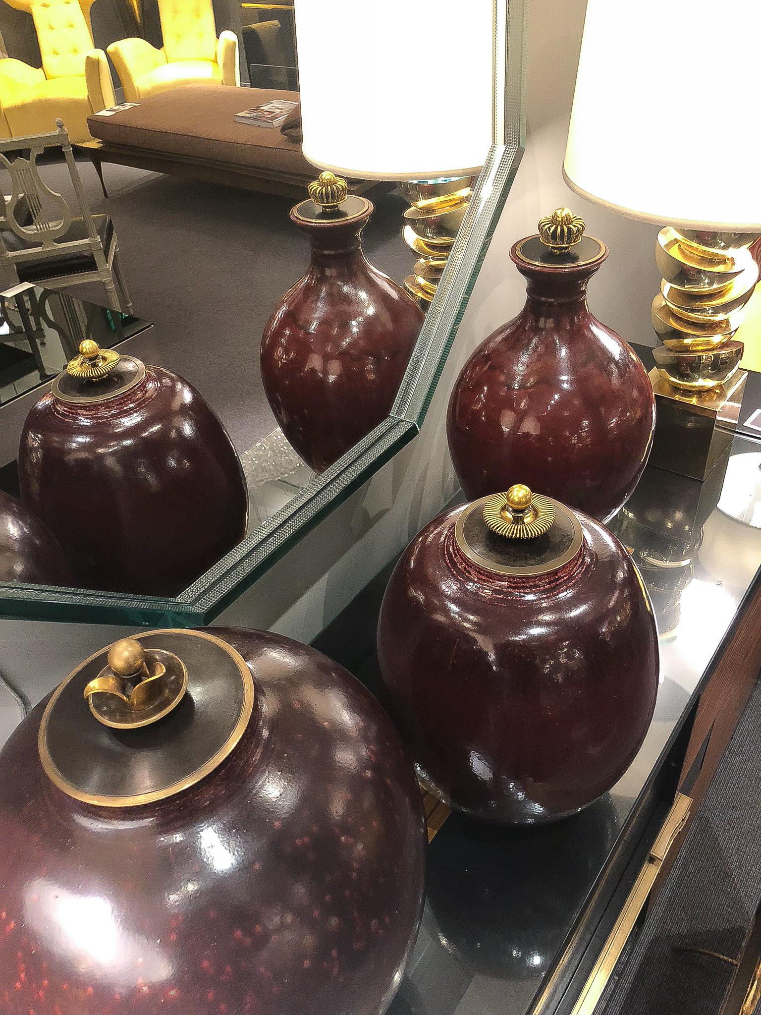 Unique stoneware vessel decorated in an oxblood glaze, an exceptionally large scale for Halier’s production; set with a gilt bronze lid and stand by Knud Andersen. Signed and dated on the underside with Halier’s monogram.

OUR REFERENCE N8689