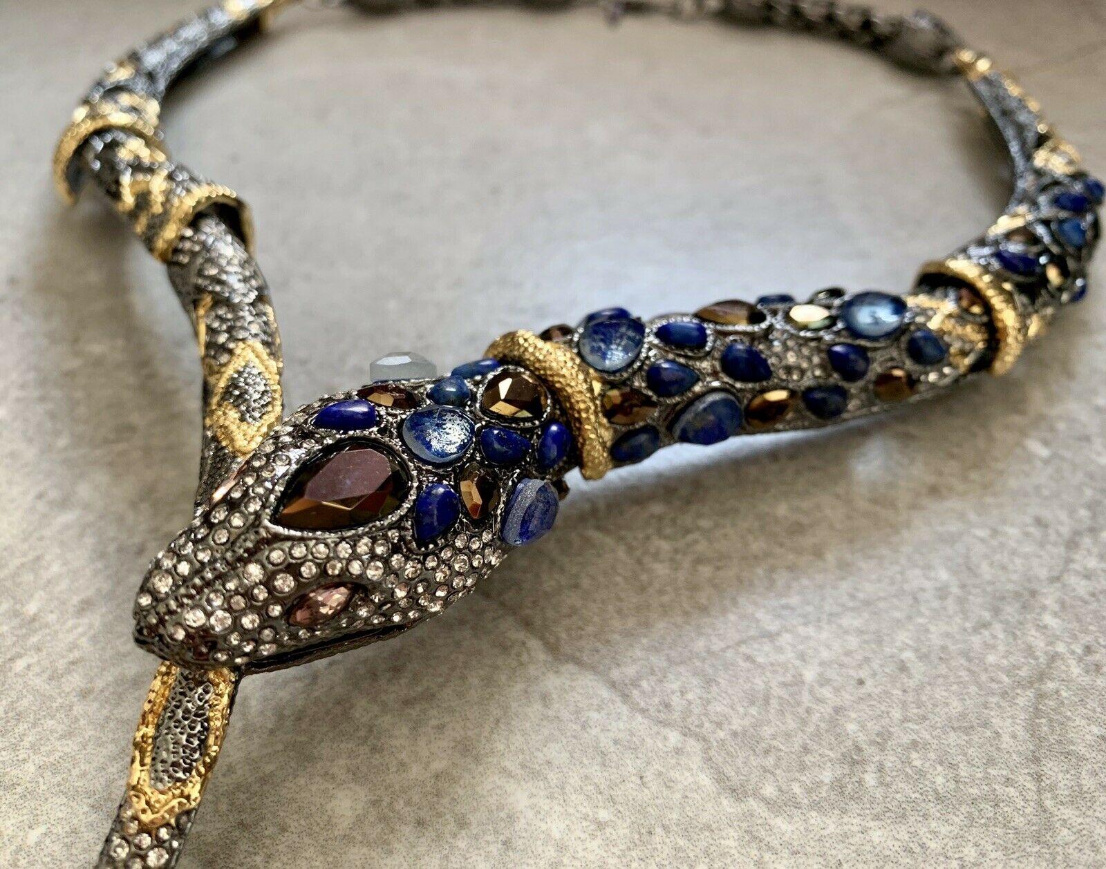 Stunning Exotic Jardin de Papillon Snake Serpent Necklace by Alexis Bittar.  Encrusted with sparkling Teardrop Blue, Brown and round Crystals inter-spaced with gold gilt accents. Approx. 18
