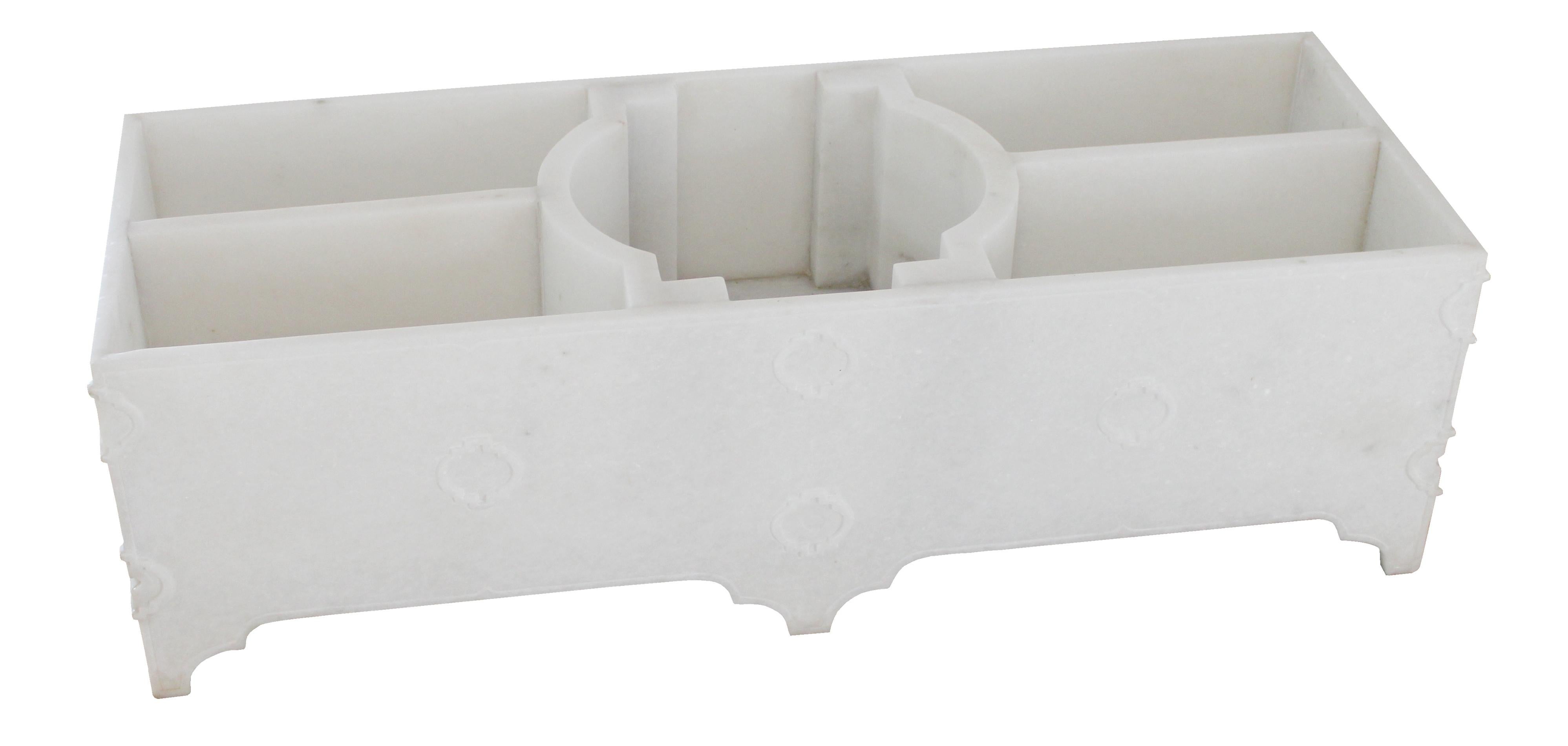 Influenced by 17th century Mughal gardens of Delhi, this planter has hand-carved details from that period. Hand-carved out of marble.Designed by Paul Mathieu for Stephanie Odegard.

Jardin Planter in White Marble 
Size- 33