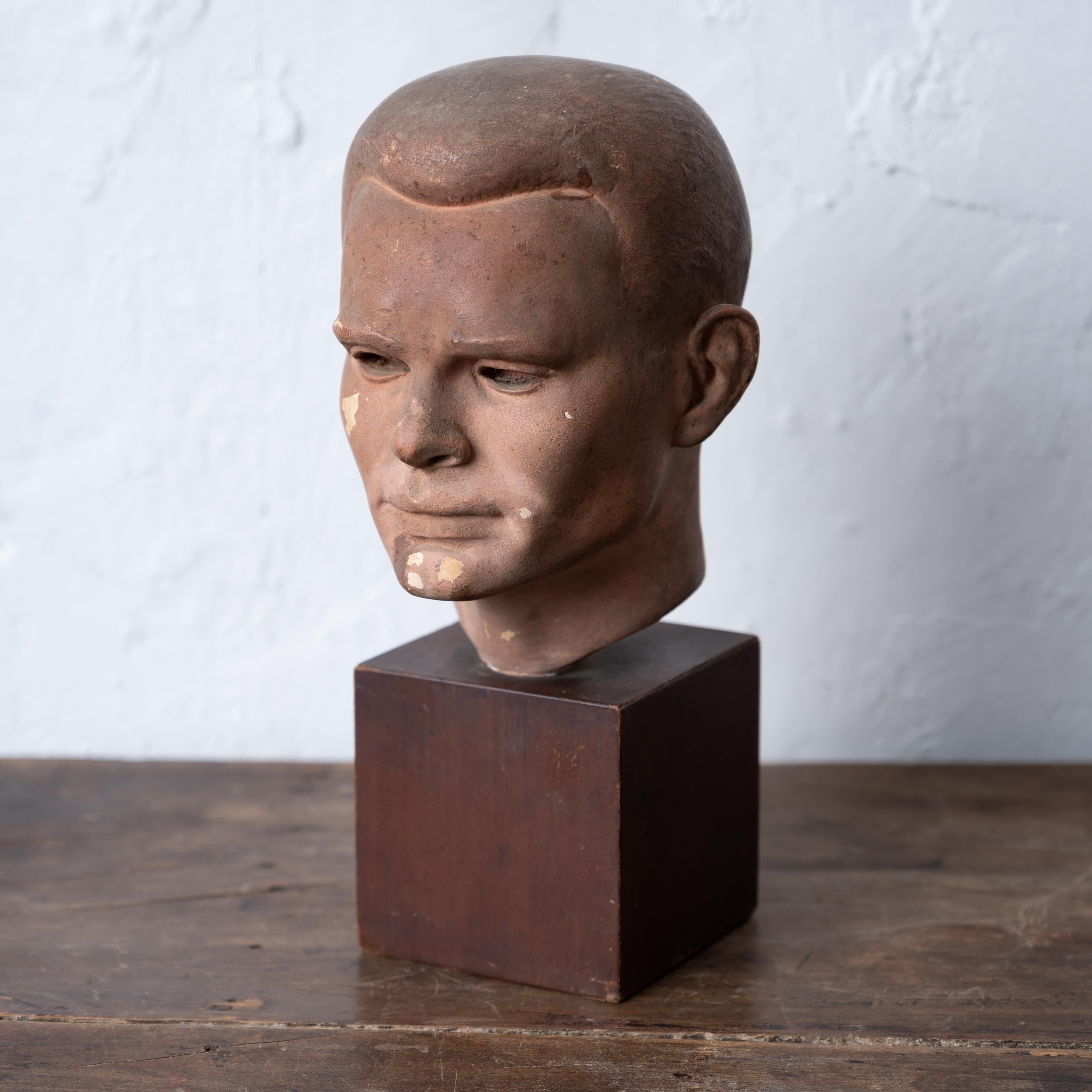 Jared French
(American, 1905-1988)

Portrait bust of Chuck Howard, 1951
plaster on wood base

Titled and signed with “CH