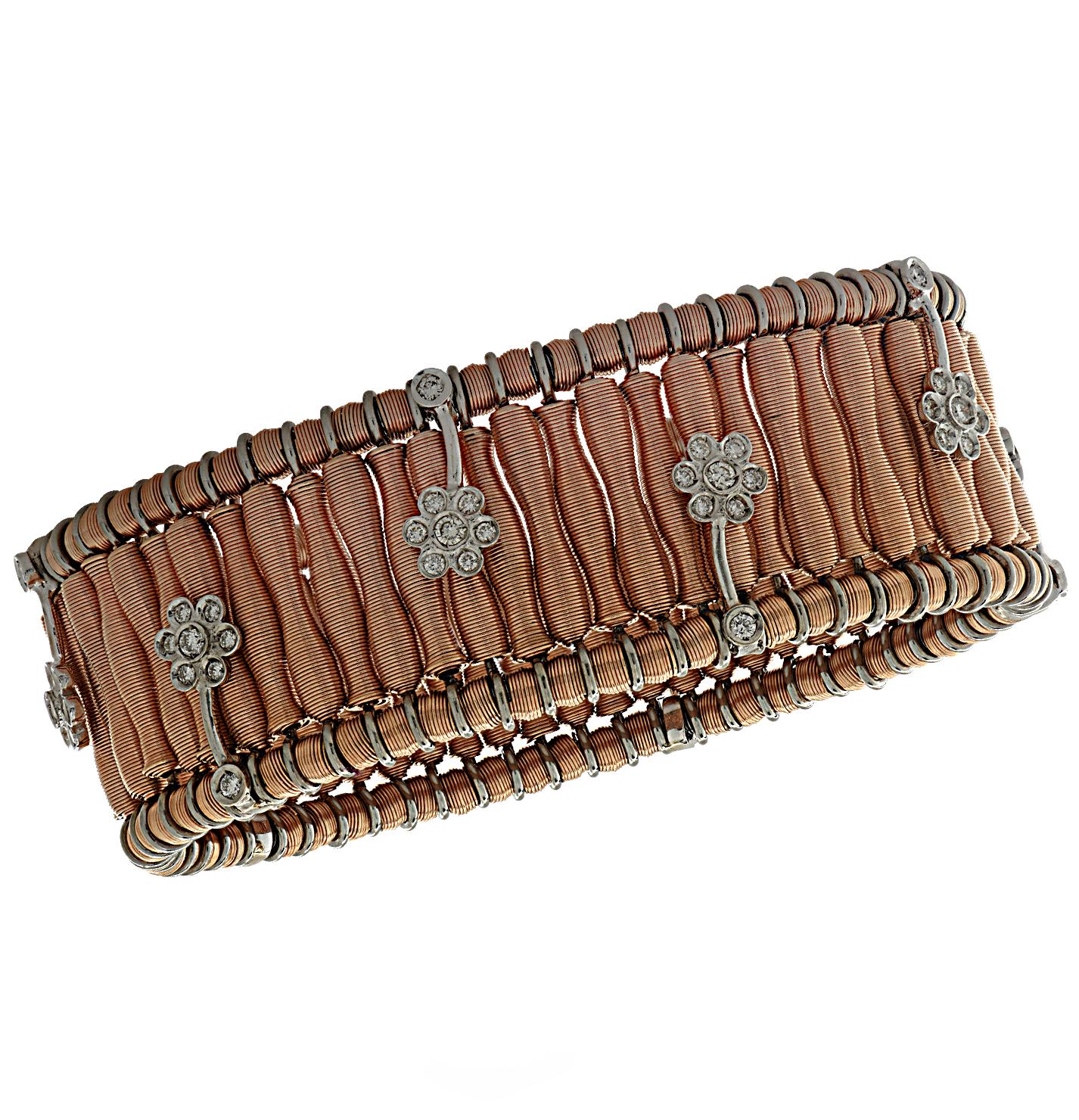 Jarretiere expandable bangle bracelet expertly crafted in Italy in 18 karat rose gold, white gold, featuring 80 round brilliant cut diamonds weighing approximately 2 carats total. Rose gold coils are adorned with diamonds, set in white gold and