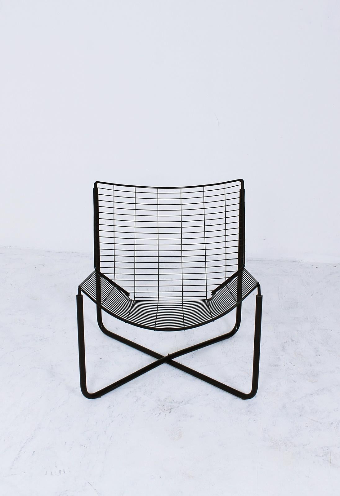 This lounge chair or easy chair was designed by Niels Gammelgaard for Ikea, and produced in 1983. 
The frame is made of black lacquered metal. 
Vintage Ikea is now becoming very collectible and these chairs have a fantastic look.

 Price is per