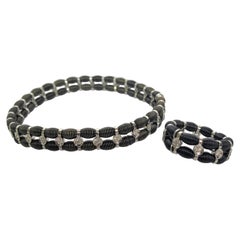 Jarretiere Bracelet et bague extensible en or noir 18 carats