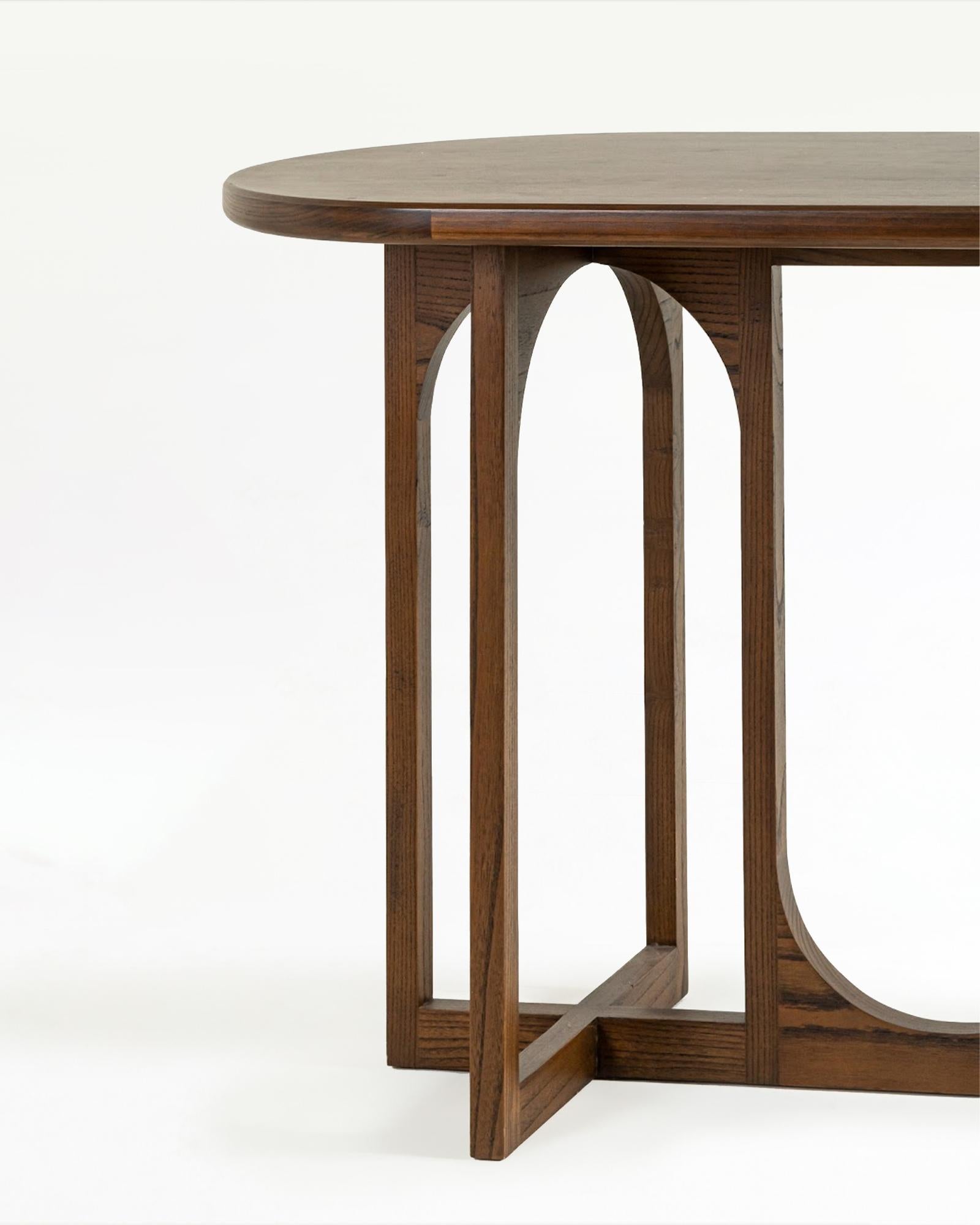 The minimal, stylistic arches of Jarvits Consoles give it a sculptured appearance, transforming it into both an artistic accent and a functional table — a nod to classical architecture and form. Its graceful arches add interest without overwhelming,