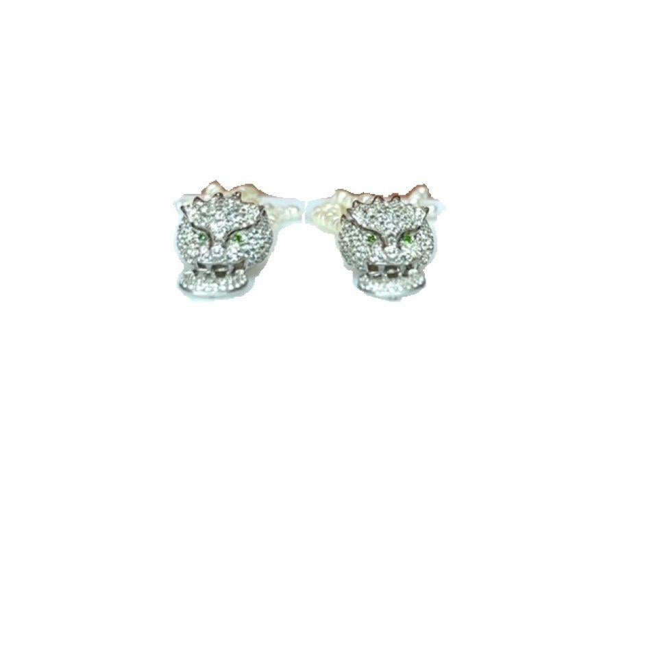 ORECCHINI IN ARGENTO STERLING CON TOPAZIO BIANCO, OCCHI IN DIOPSIDE CROMATO E PERLE D'ACQUA DOLCE CON TESTA DI PANTERA

Metallo:                          Argento
Info sulle pietre:               Topazio bianco - 3,00Ct 
                             