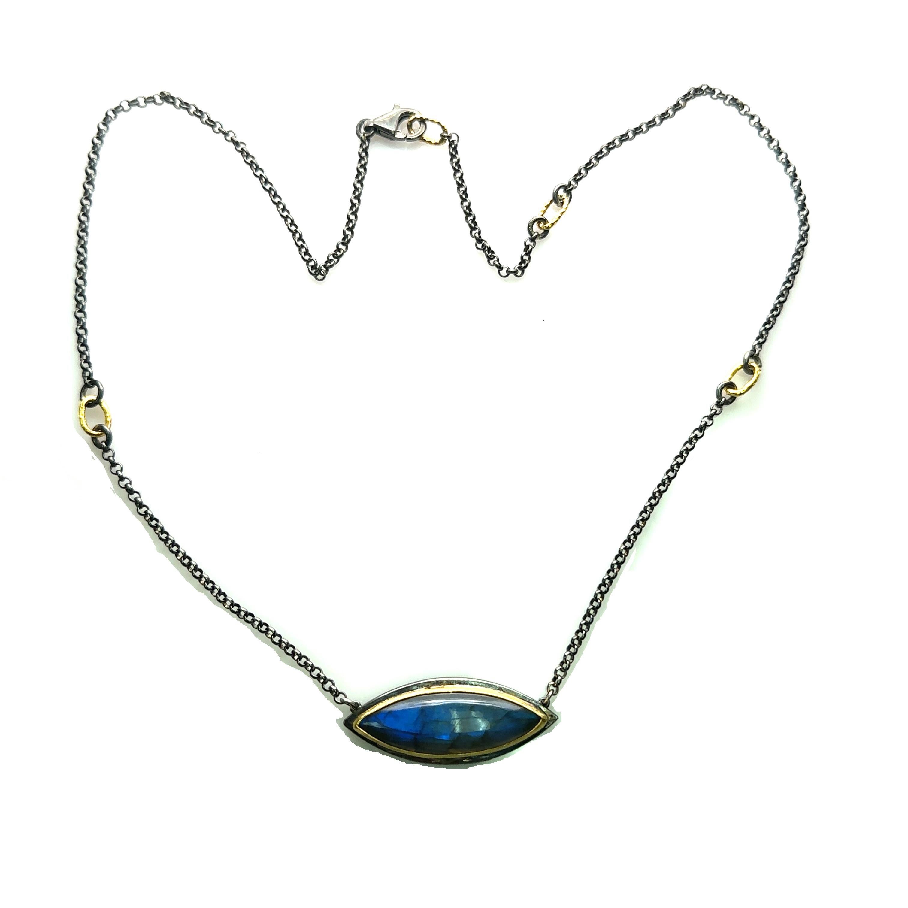 24KT GOLD/SS 18” NECKLACE with 30X10MM BLUE LABRADORITE 
Metal: 24K GOLD/OXIDIZED SS
Stone Info: 
30X10MM BLUE LABRADORITE Marquise Shape
Total Stone Weight: 5.00 cwt.
Item Weight:  11.60 gm
Necklace Size: 16+2 =18”
Measurements: 33.75mm x 13.25mm
