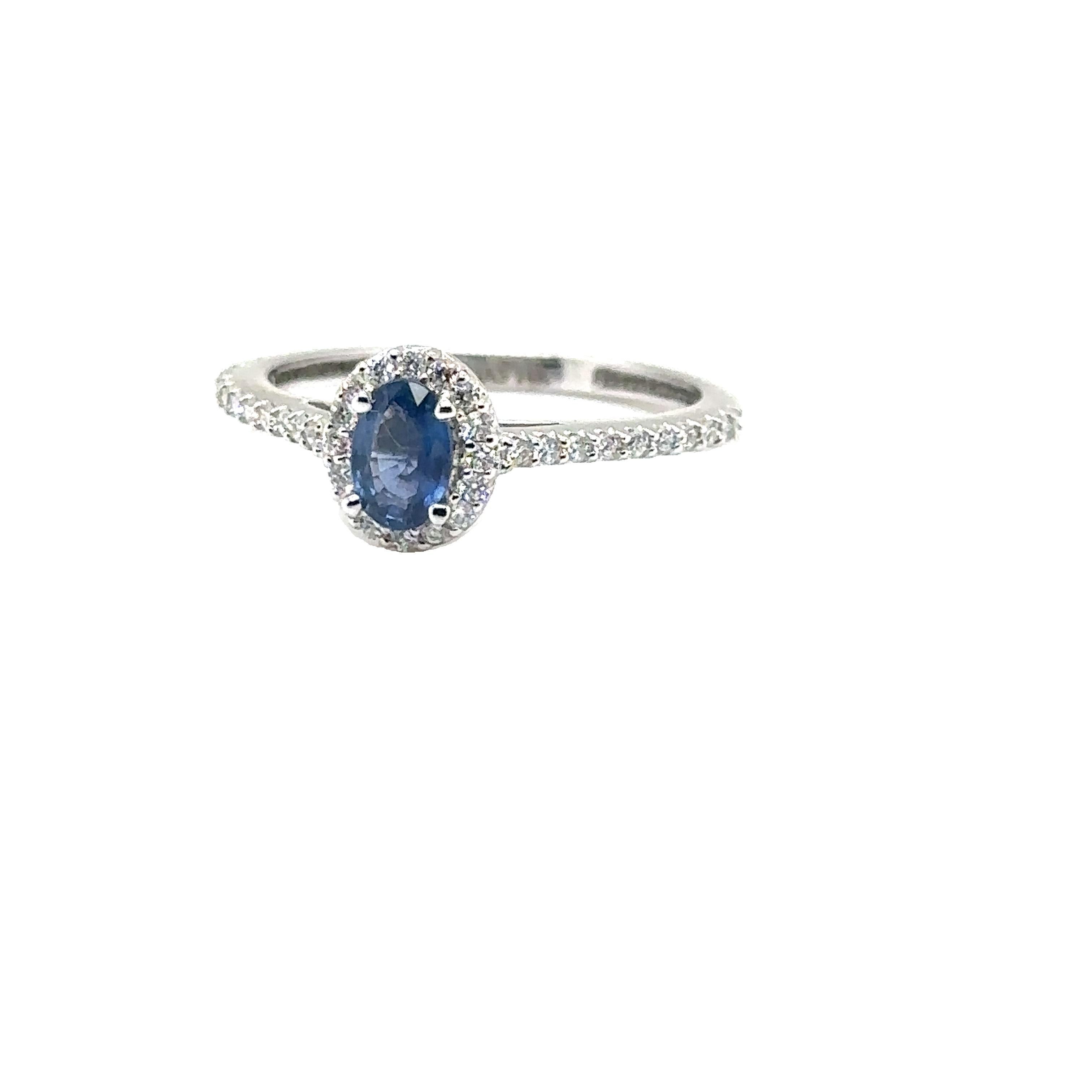 14K WHITE GOLD OVAL SAPPHIRE RING with DIAMONDS 
Metal: 14K WHITE GOLD
Diamond Info: GH SI DIAMONDS 0.20CT
Stone Info: 6X4 OVAL SAPPHIRE 0.52CT
Total Dia Weight: 0.20 cwt.
Total Stone Weight: 0.52 cwt.
Item Weight:  2.22 gm
Ring Size: 8