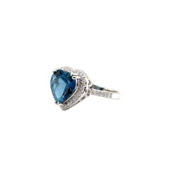 JAS-21-2259 - 14K WG 0.75Ct GH-SI1 DIAMONDS & 12MM HEART SHAPE LONDON BLUE TOPAZ