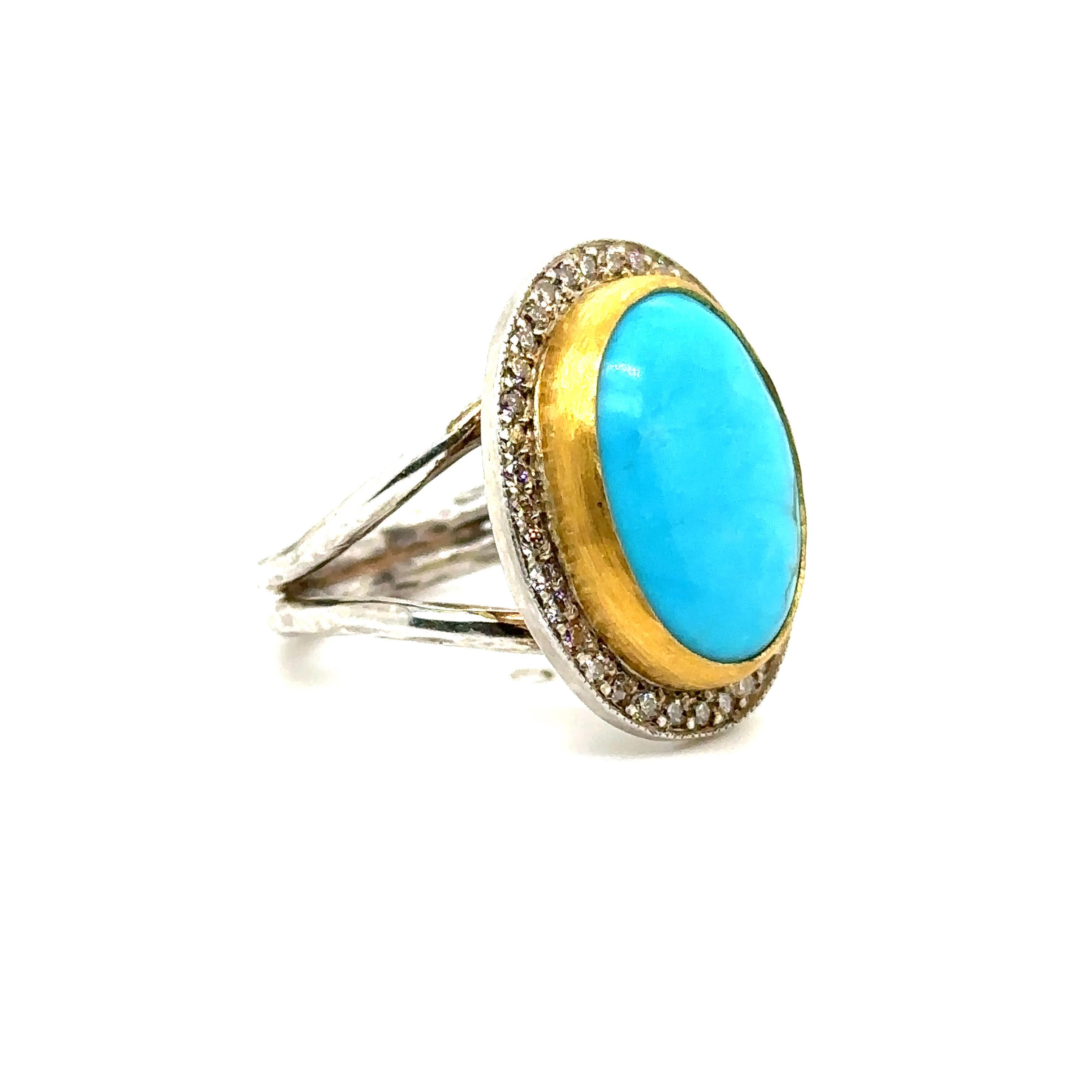 ANELLO IN ORO 24K/argento Sterling 0.44Ct CHAMPAGNE DIAS. 
Metallo: ORO 24K/SS
Info sui diamanti: DIAMANTI CHAMPAGNE SI/12 0,44CT
Informazioni sulla pietra: 18X13MM KINGMAN TURQUOISE 8.30 CT
Peso totale in ct: 0.44 cwt.
Peso dell'articolo: 10.57