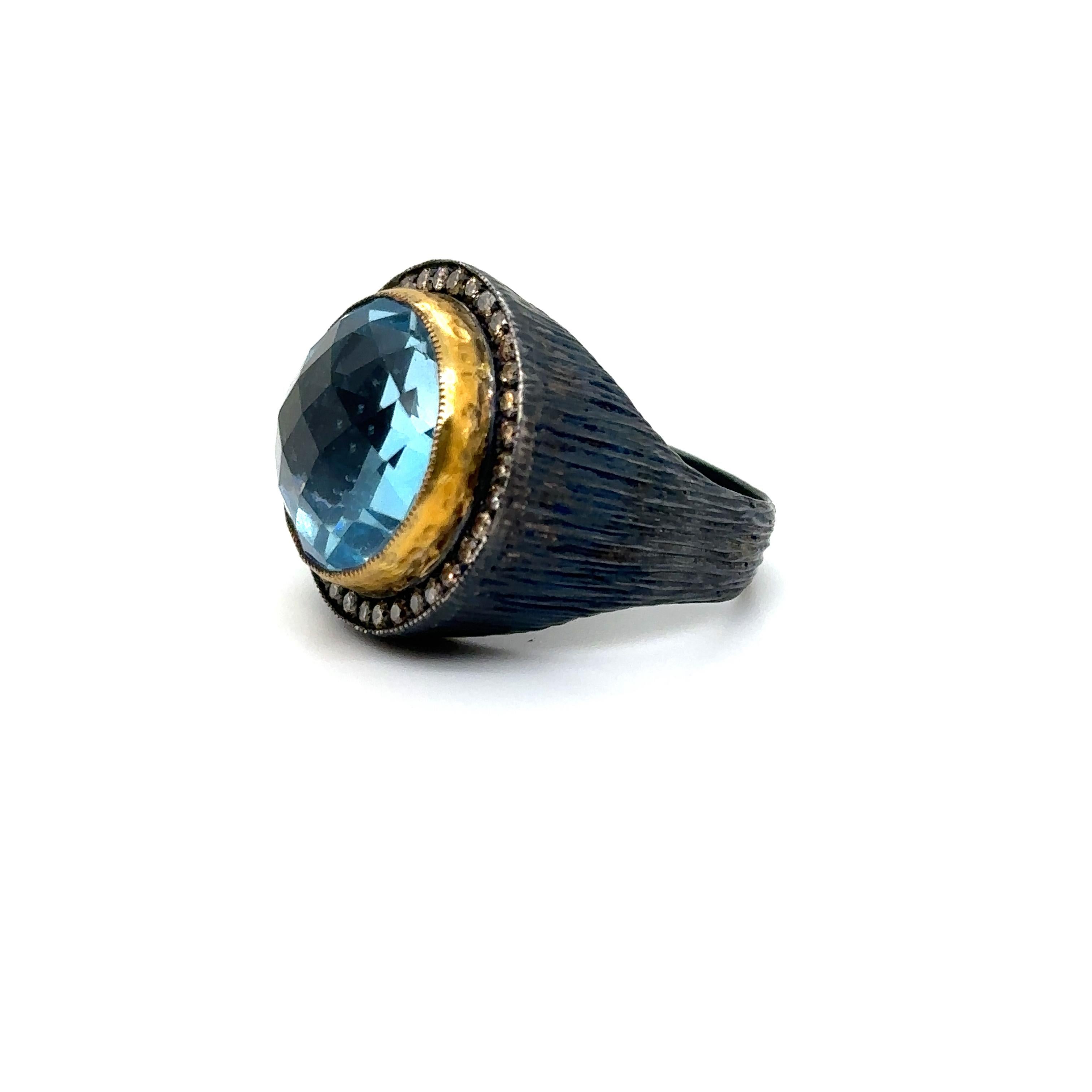24K/SS BRIO. SKY BLUE TOPAZ HAND MADE RING with CHAMPAGNE DIAMONDS

Metal: 24K Yellow Gold & Sterling Silver
Stone Info: Brio Sky Blue Topaz
Stone Weight: 13.00 Ctw
Diamond info: Round Champagne Diamonds
Diamond Weight: 0.55 Ctw
Ring Size: 6.5