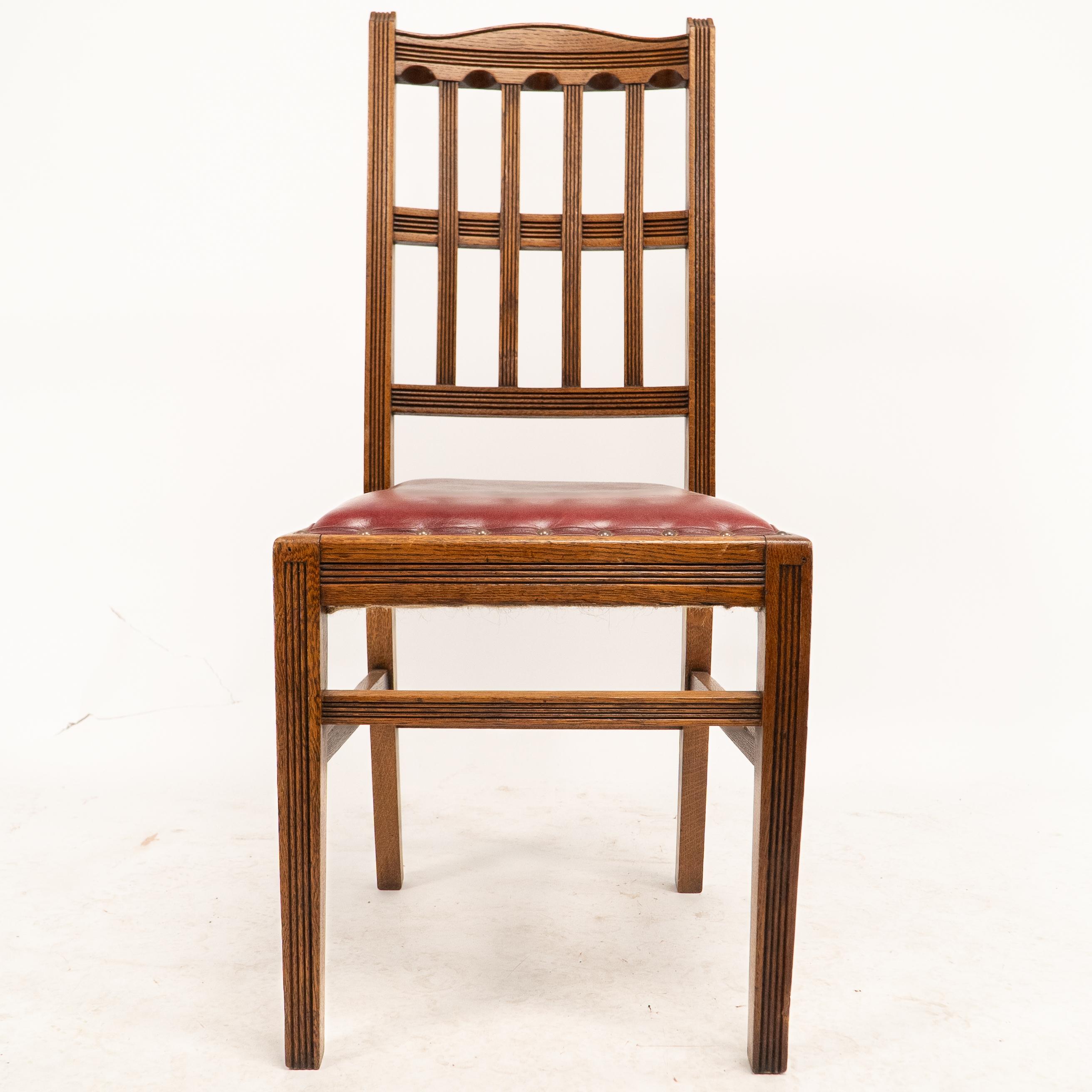 Jas Shoolbred. A set of four Aesthetic Movement lattice back oak dining chairs 3