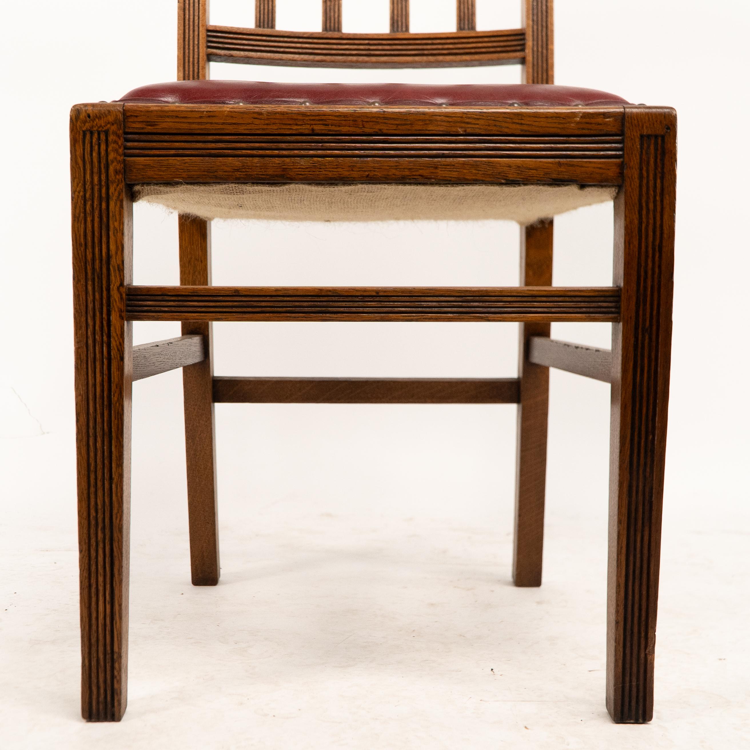 Jas Shoolbred. A set of four Aesthetic Movement lattice back oak dining chairs 4