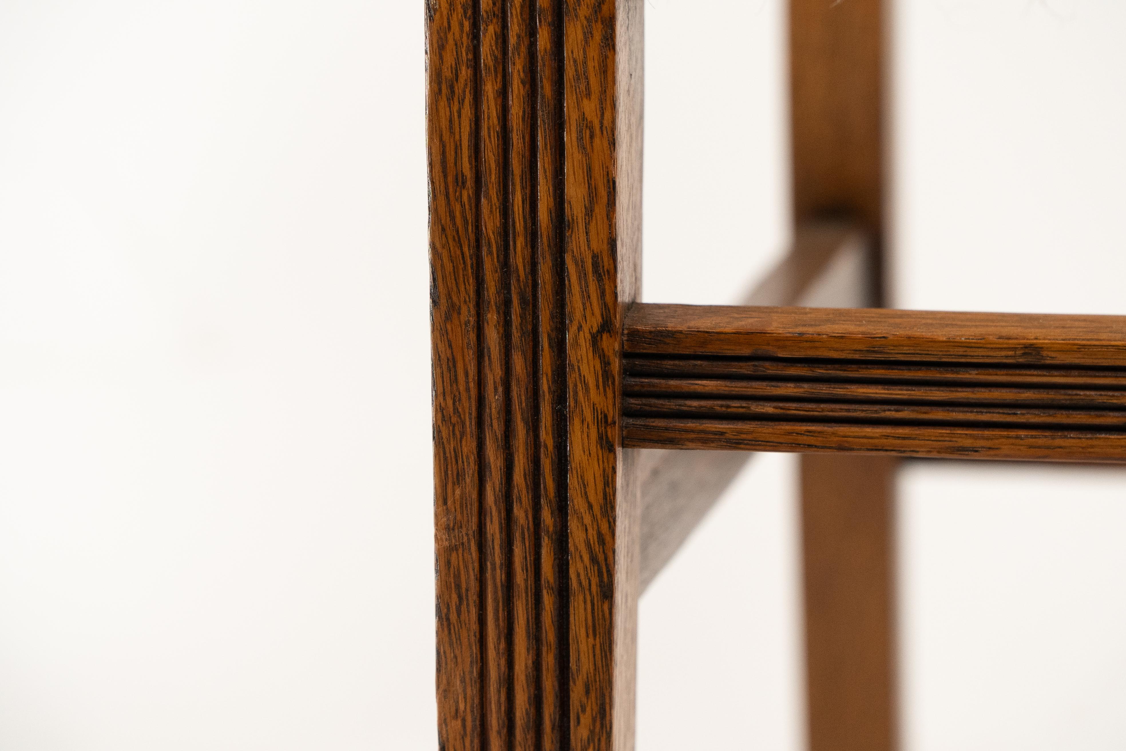 Jas Shoolbred. A set of four Aesthetic Movement lattice back oak dining chairs 5