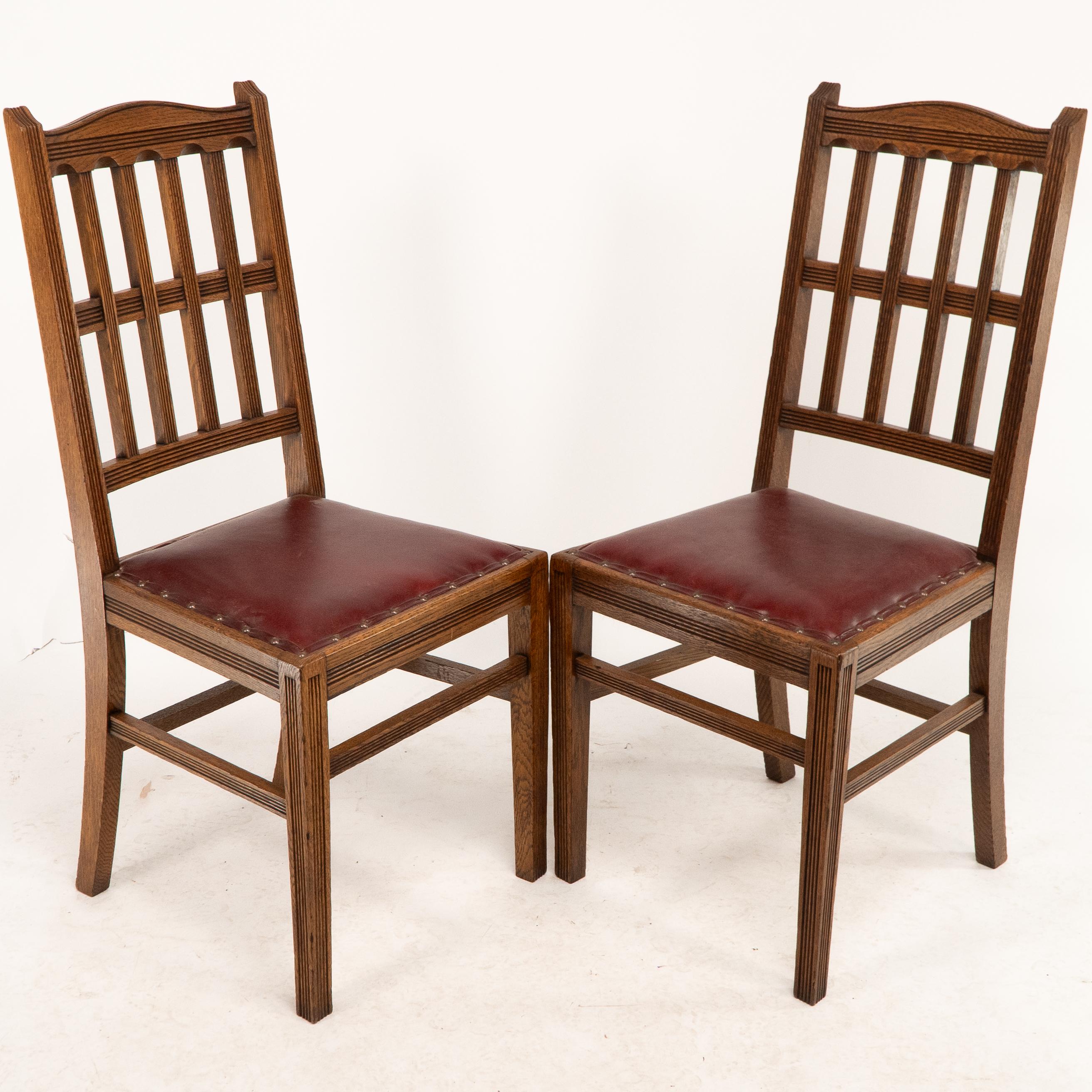 Jas Shoolbred attributed. A nice quality set of four Aesthetic Movement oak dining chairs with lattice designs to the backs and tramline details throughout, professionally reupholstered in a quality hide