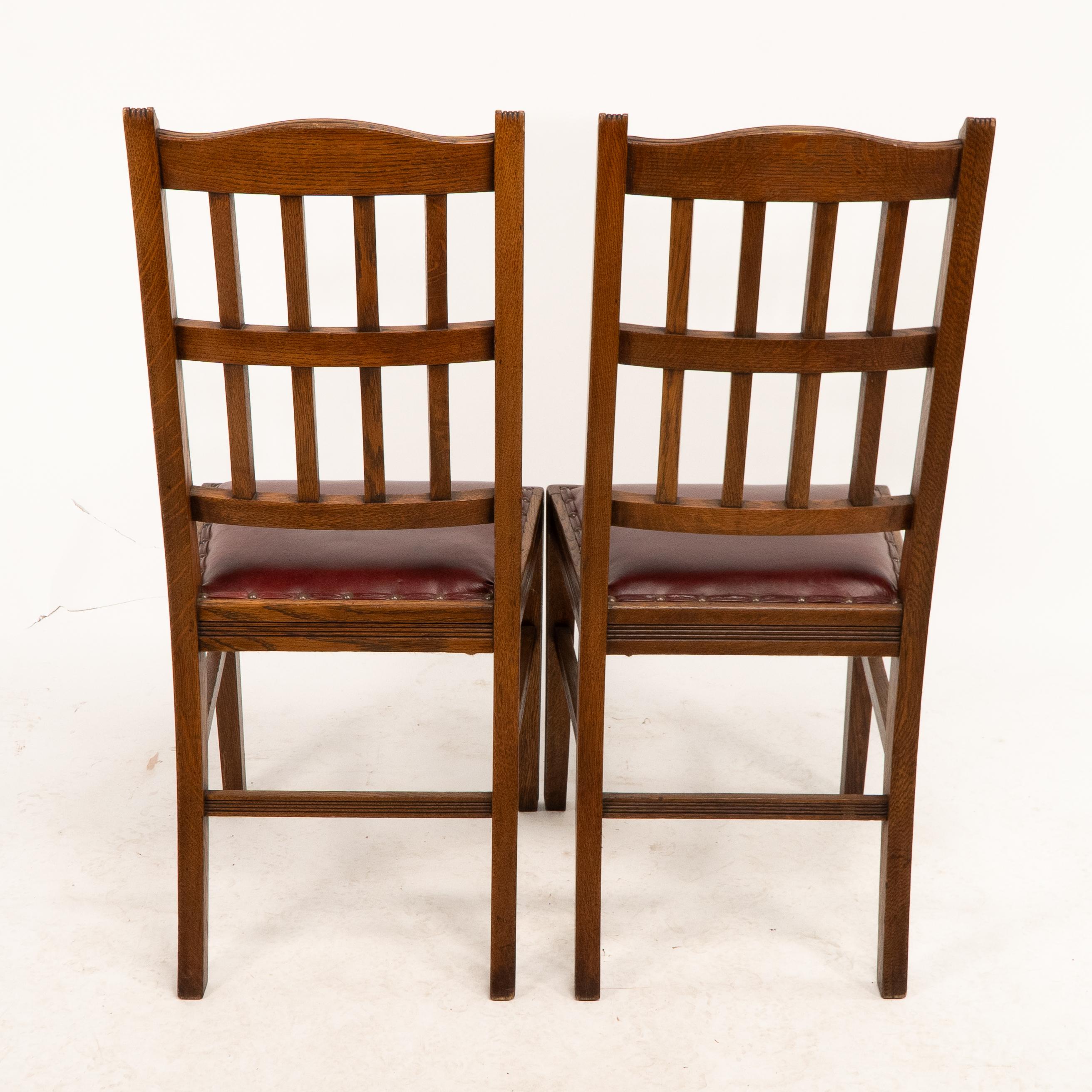 Hand-Crafted Jas Shoolbred. A set of four Aesthetic Movement lattice back oak dining chairs For Sale