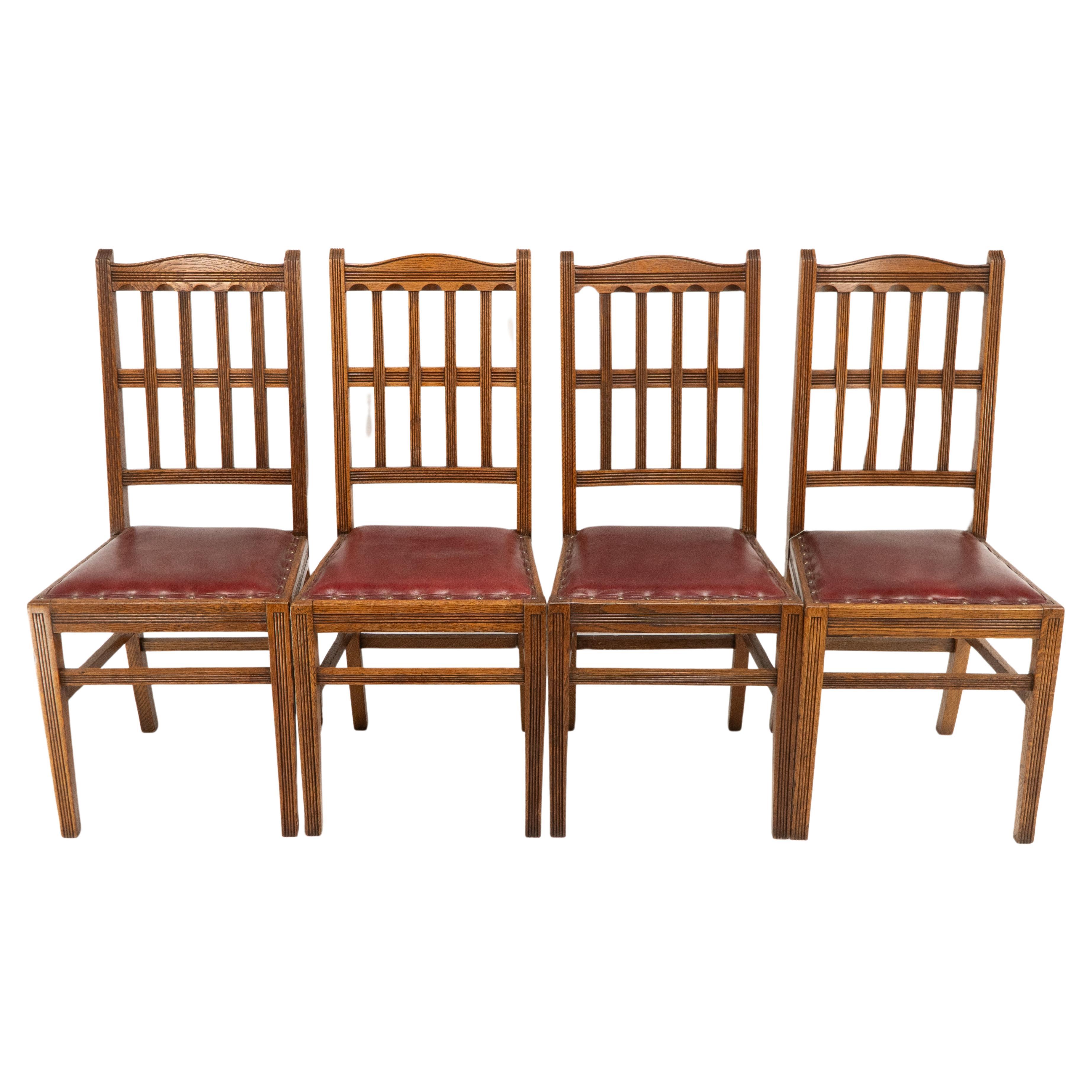 Jas Shoolbred. A set of four Aesthetic Movement lattice back oak dining chairs For Sale