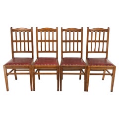 Jas Shoolbred. A set of four Aesthetic Movement lattice back oak dining chairs