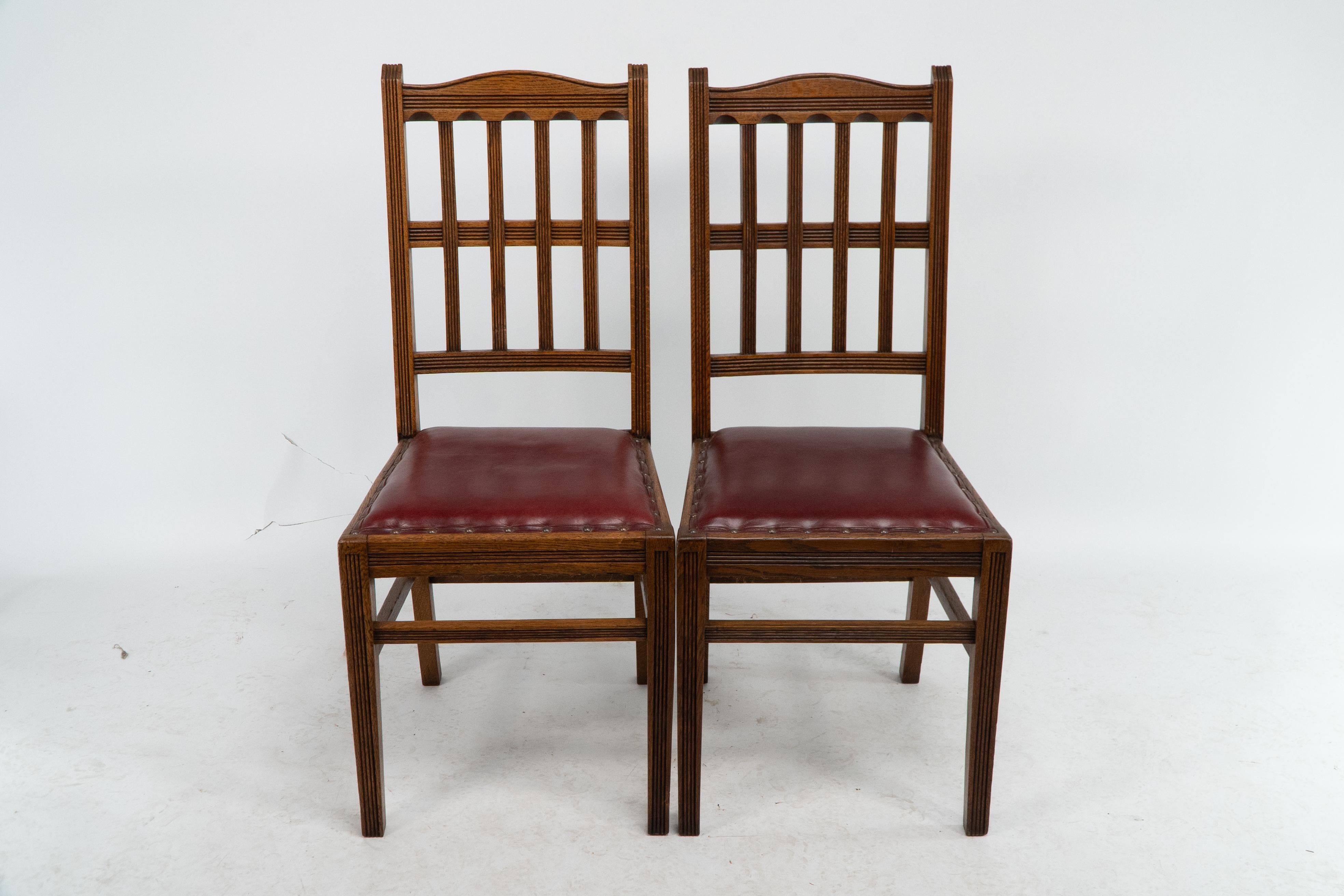 Jas Shoolbred attributed. A nice quality set of four Aesthetic Movement oak dining chairs with lattice designs to the backs and tramline details throughout, professionally reupholstered in a quality hide
