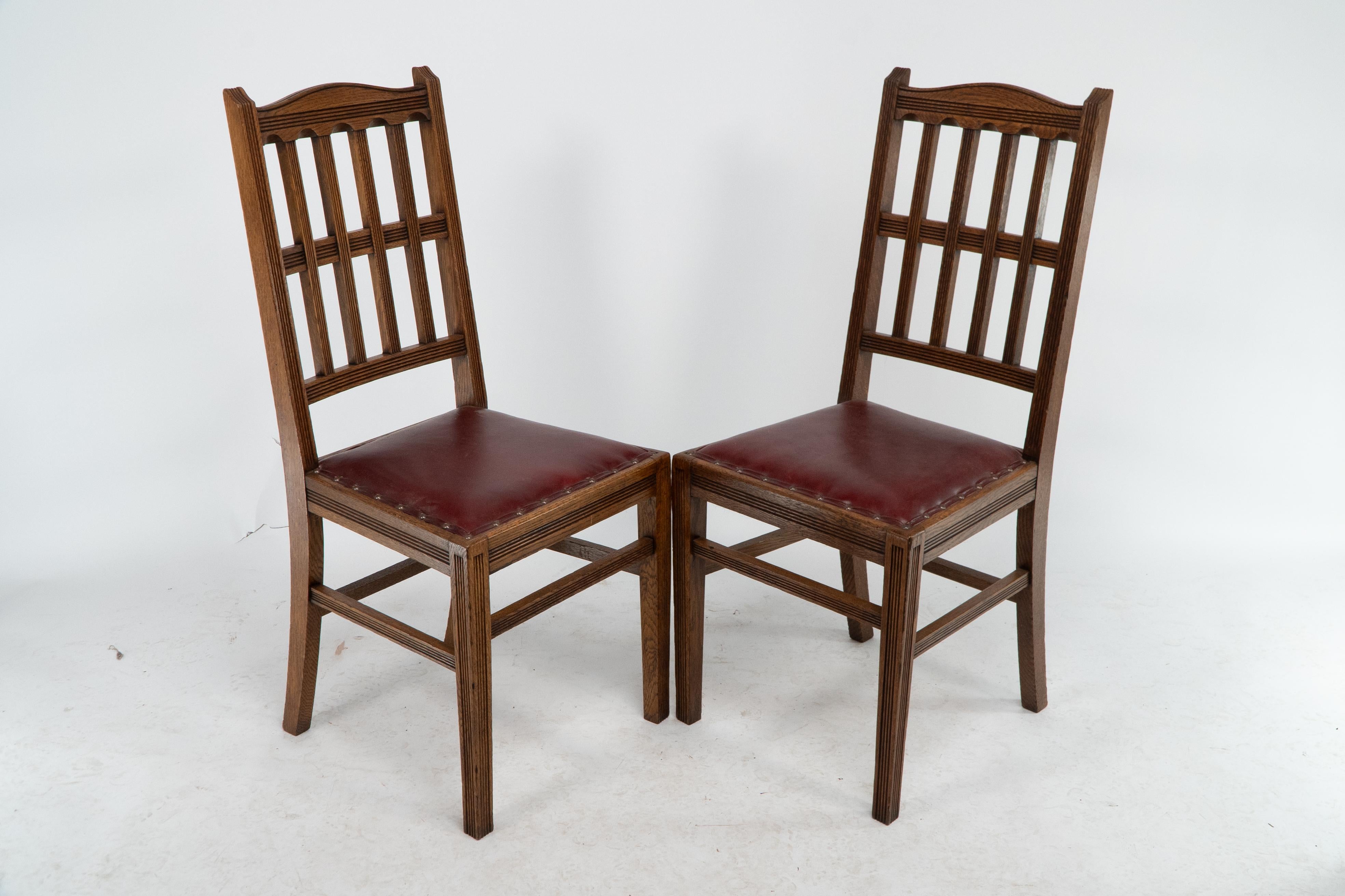 Oak Jas Shoolbred. A set of four Aesthetic Movement lattice back oak dining chairs. For Sale