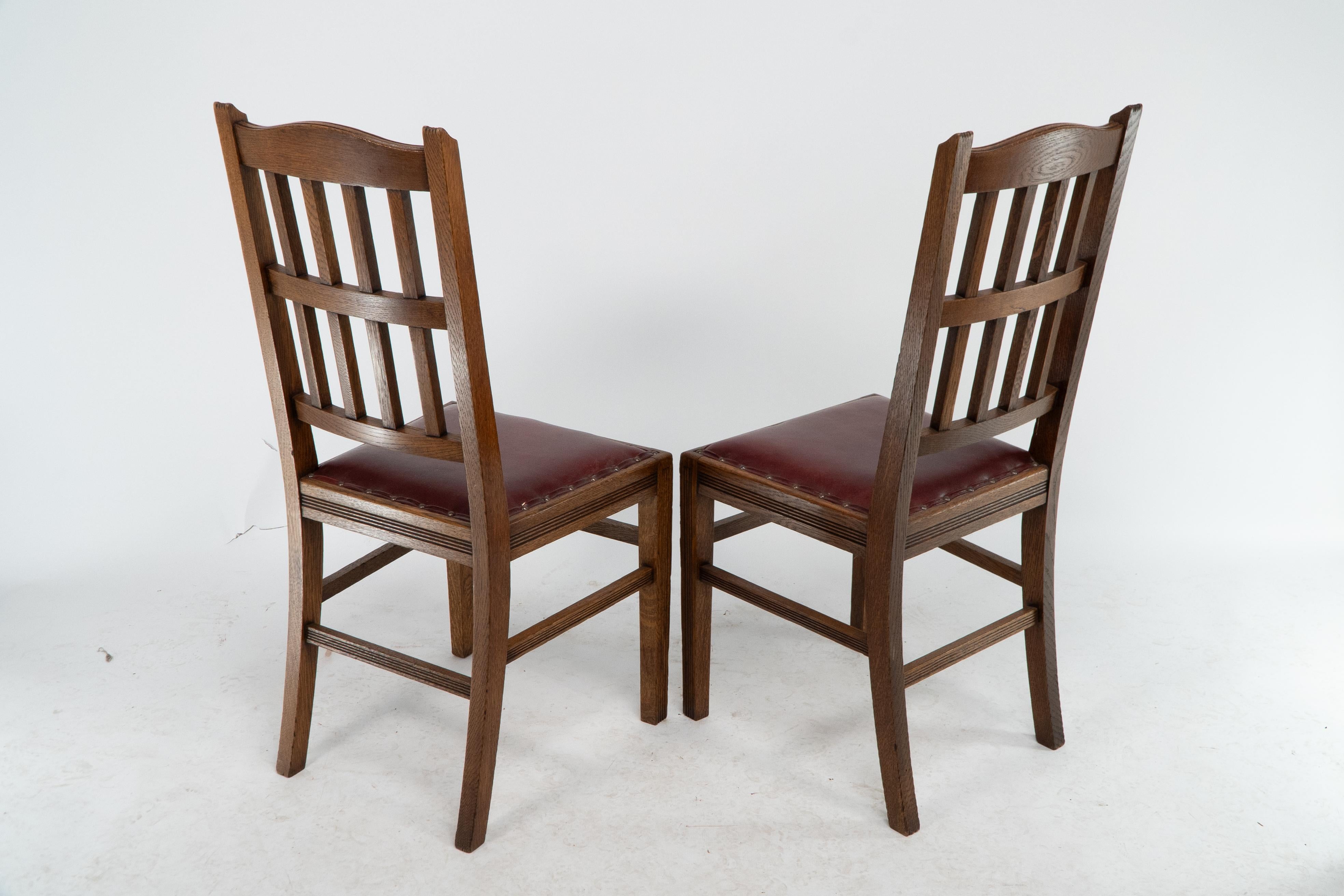 Jas Shoolbred. A set of four Aesthetic Movement lattice back oak dining chairs. For Sale 1