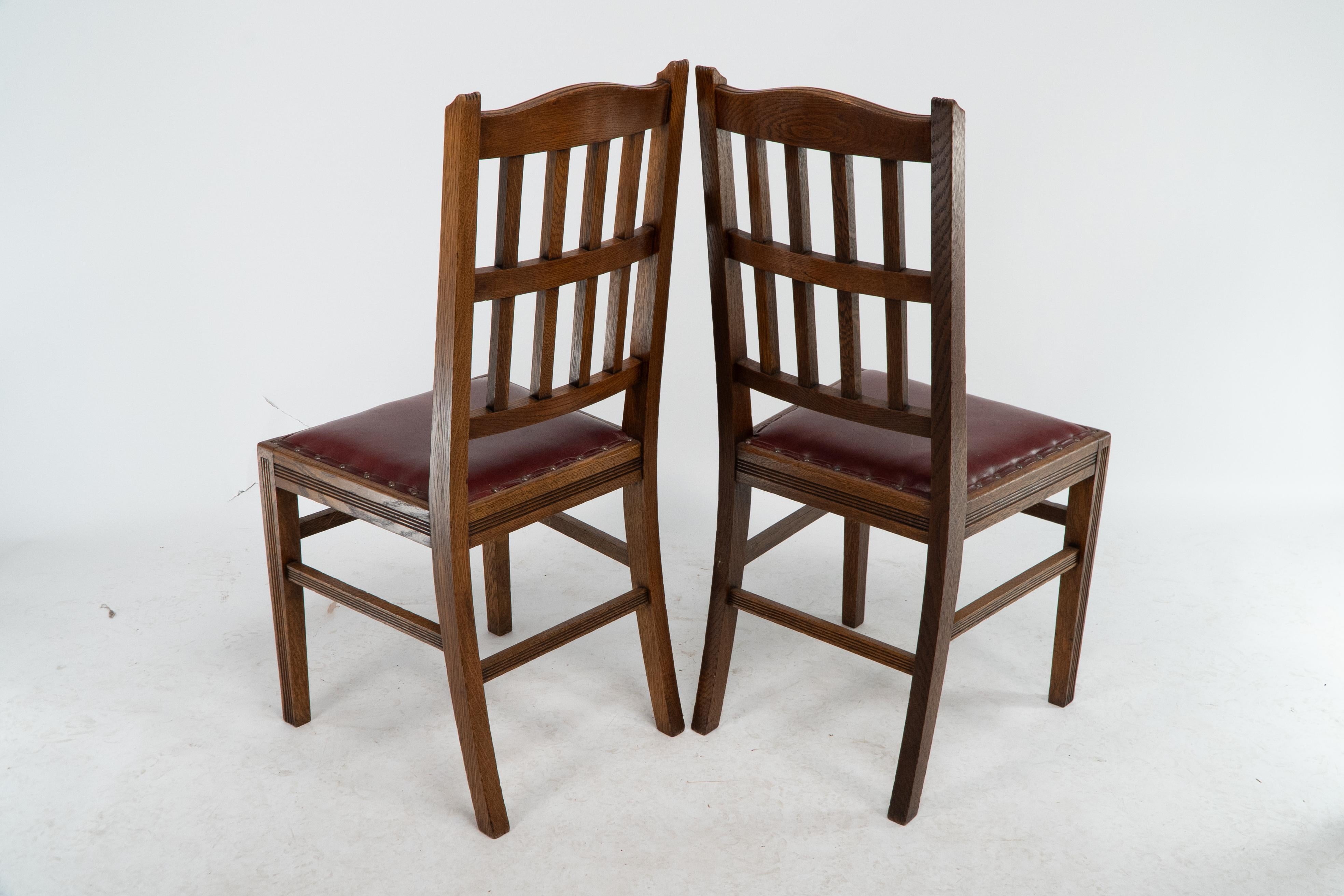 Jas Shoolbred. A set of four Aesthetic Movement lattice back oak dining chairs. For Sale 2
