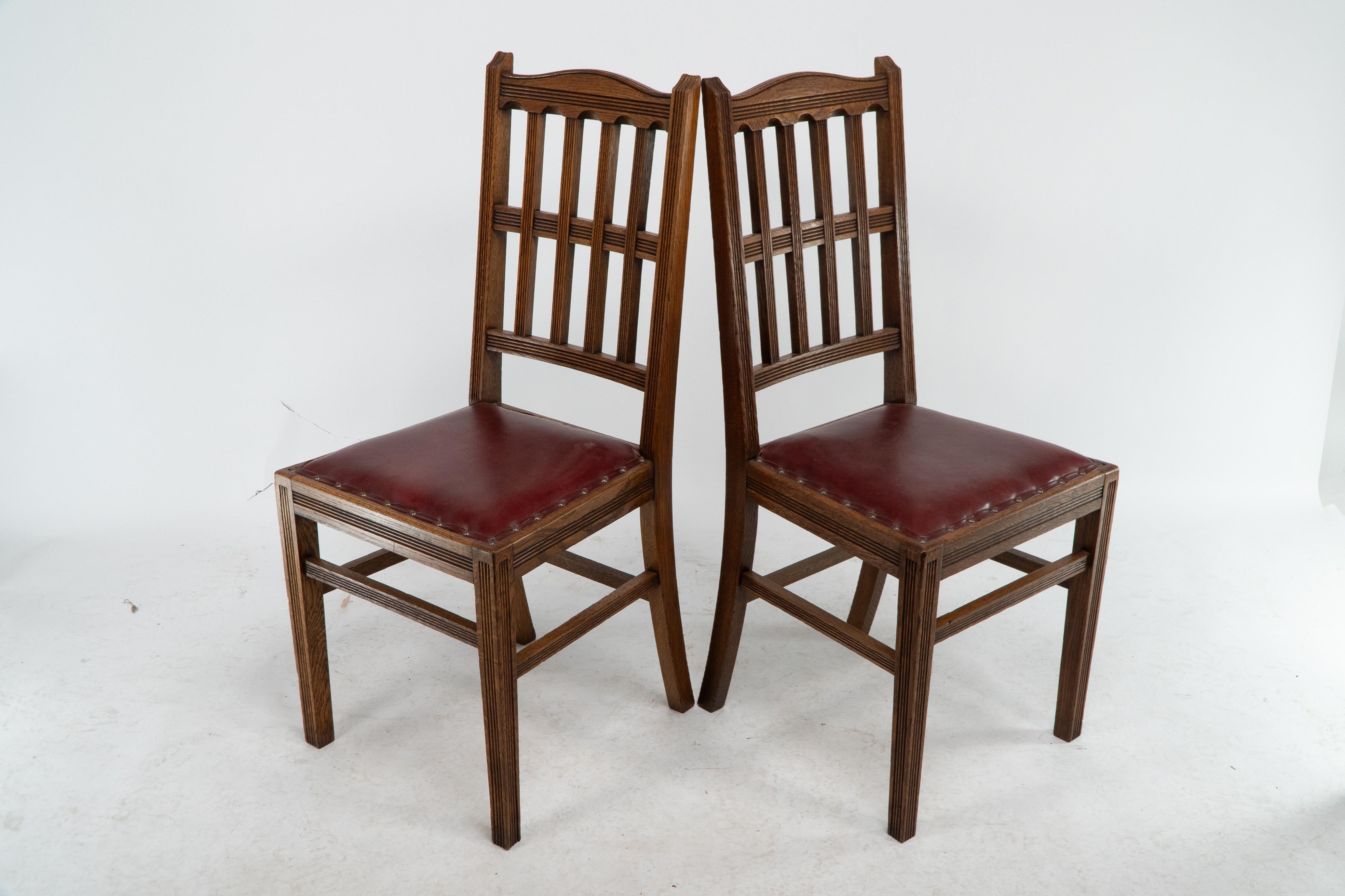 Jas Shoolbred. A set of four Aesthetic Movement lattice back oak dining chairs. For Sale 3