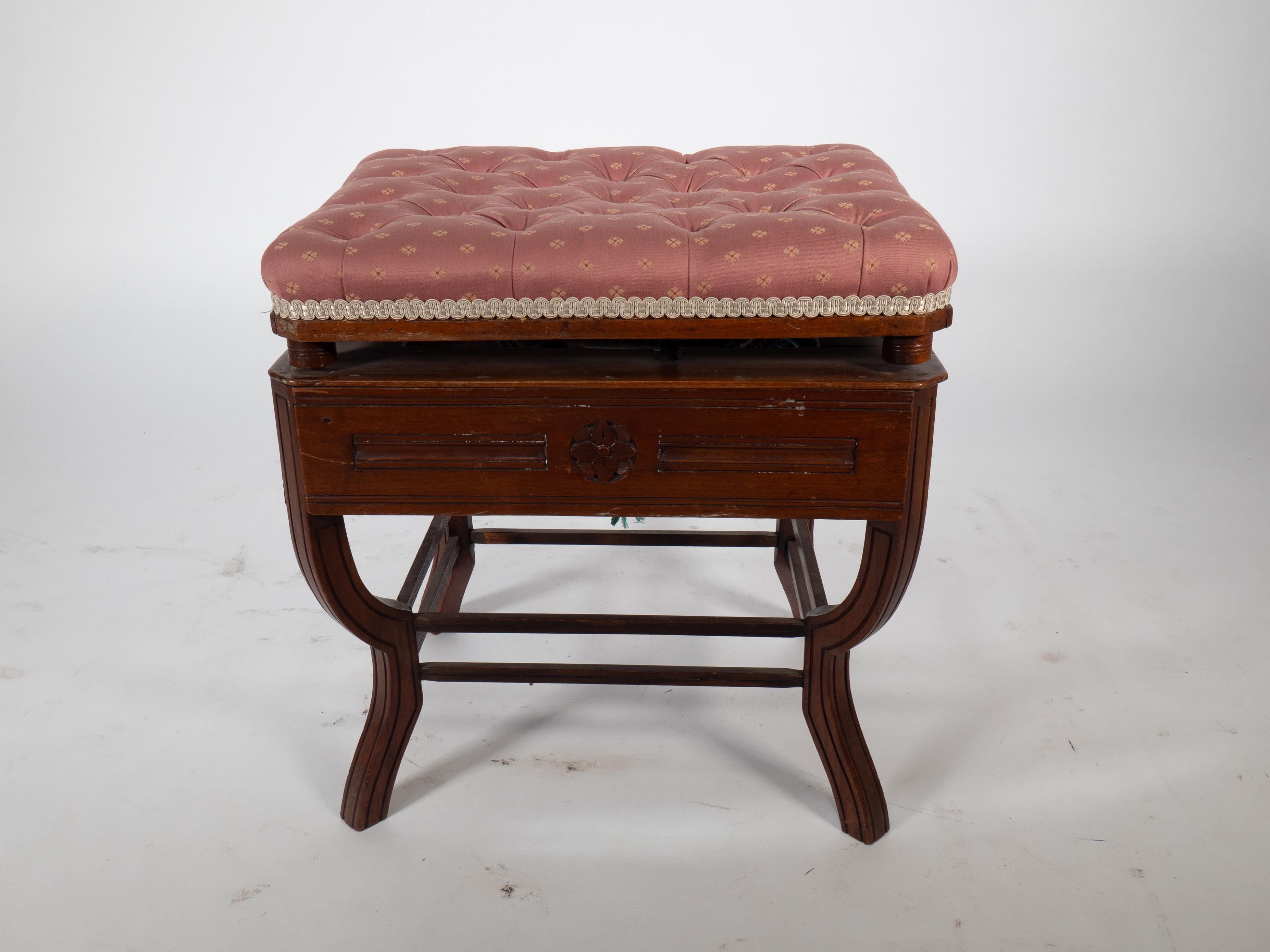 Late 19th Century Jas Shoolbred. An Aesthetic Movement adjustable height piano stool For Sale