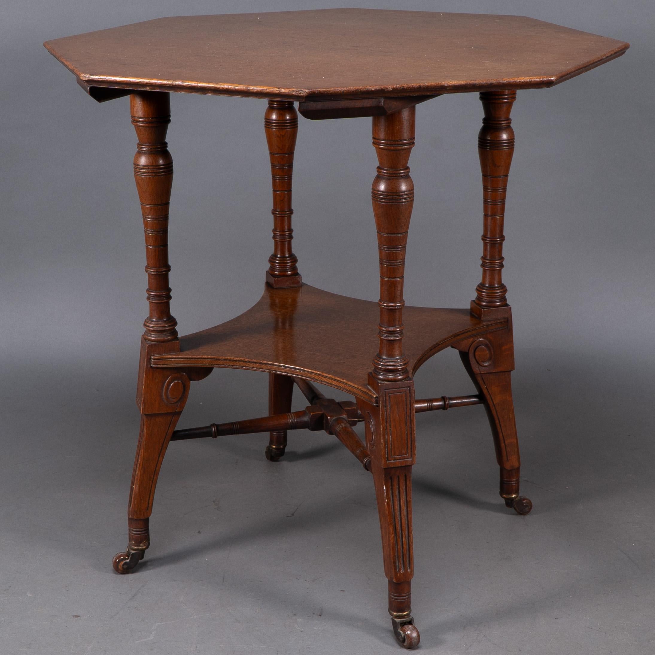 Jas Shoolbred. An Aesthetic Movement walnut octagonal center table For Sale 4