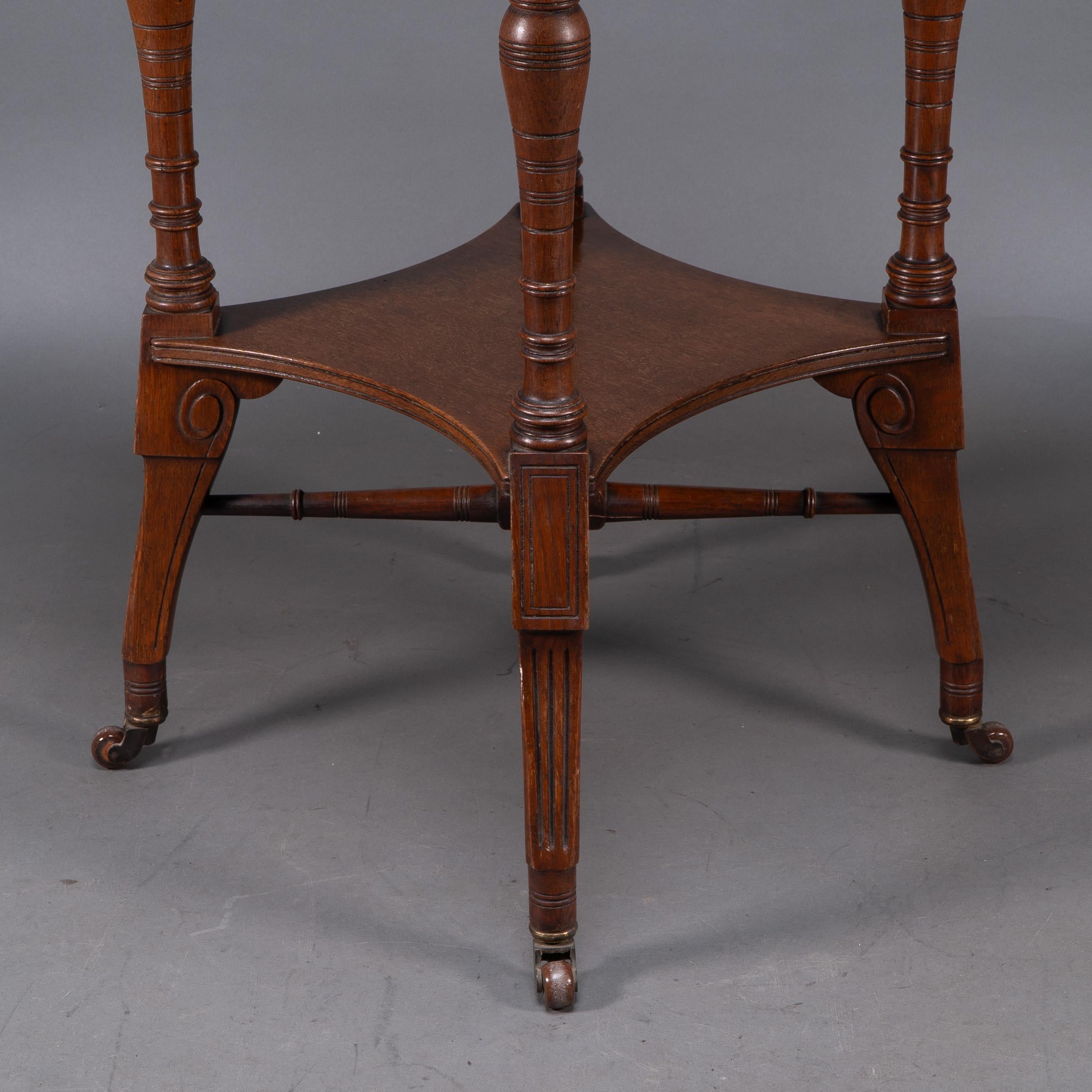 Jas Shoolbred. An Aesthetic Movement walnut octagonal center table For Sale 5