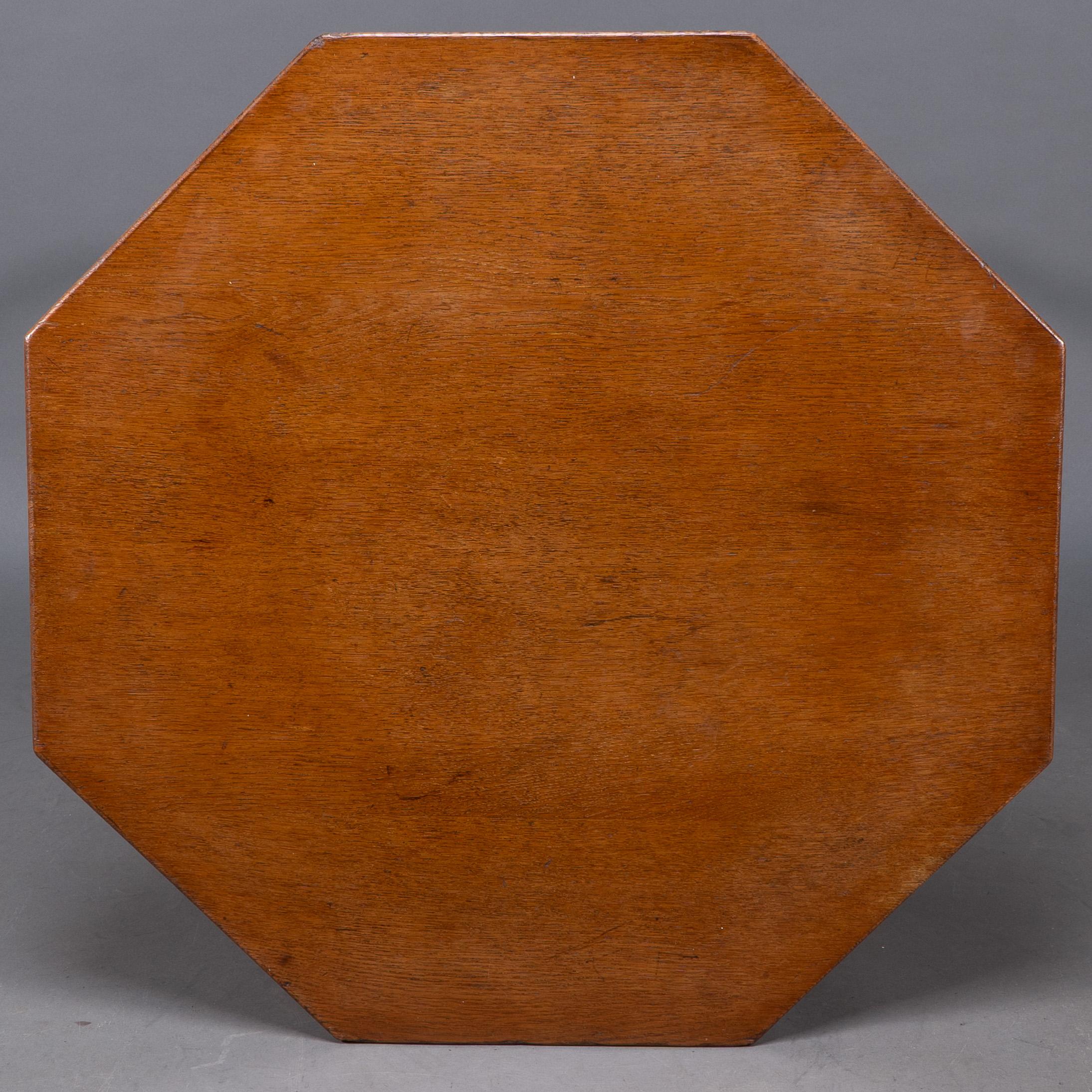 Jas Shoolbred. An Aesthetic Movement walnut octagonal center table For Sale 3