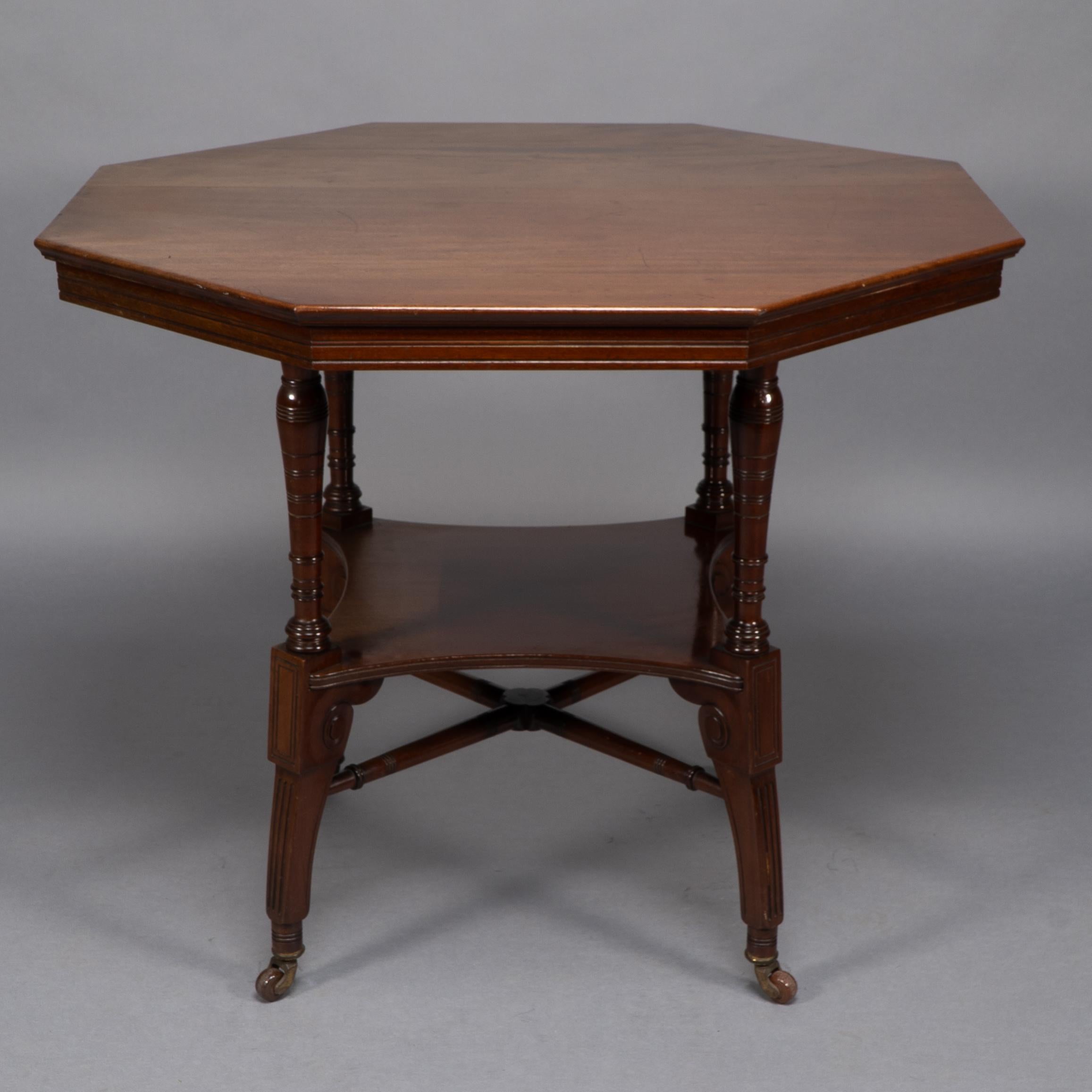 Oak Jas Shoolbred Attri, An Aesthetic Movement octagonal shaped centre table For Sale