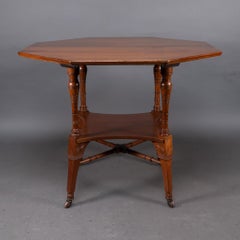 Jas Shoolbred attri. An Aesthetic Movement octagonal walnut side table