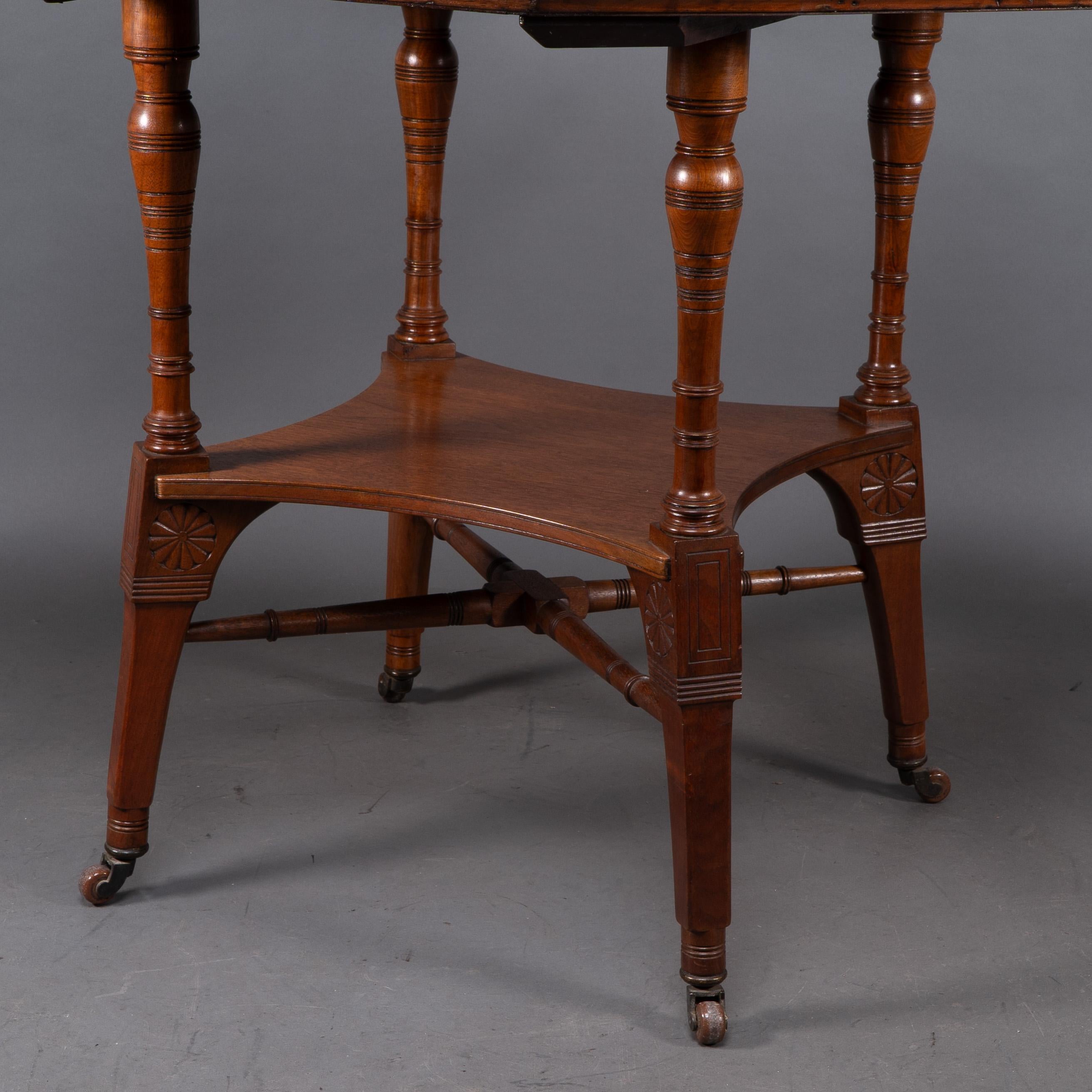 Jas Shoolbred attri. An Aesthetic Movement octagonal walnut side table For Sale 2