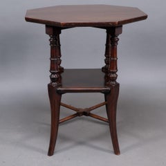 Jas Shoolbred attributed. An Aesthetic Movement octagonal Mahogany side table