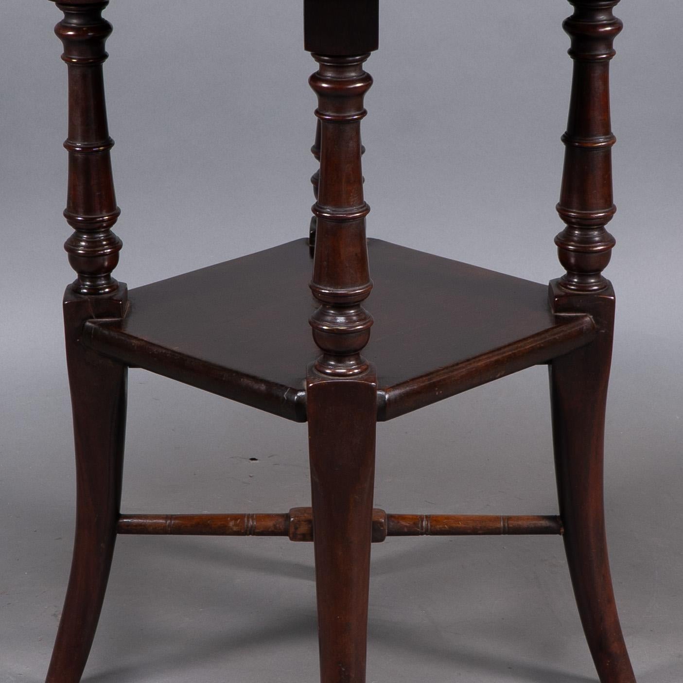 Jas Shoolbred attributed. An Aesthetic Movement octagonal Mahogany side table For Sale 4