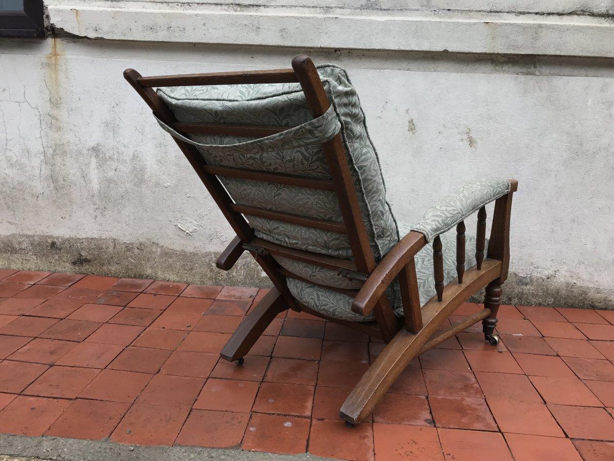 Aesthetic Movement Jas Shoolbred, in the Style of Morris & Co. a Reclining Upholstered Armchair For Sale