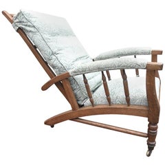 Jas Shoolbred, dans le style de Morris & Co., un fauteuil inclinable rembourré