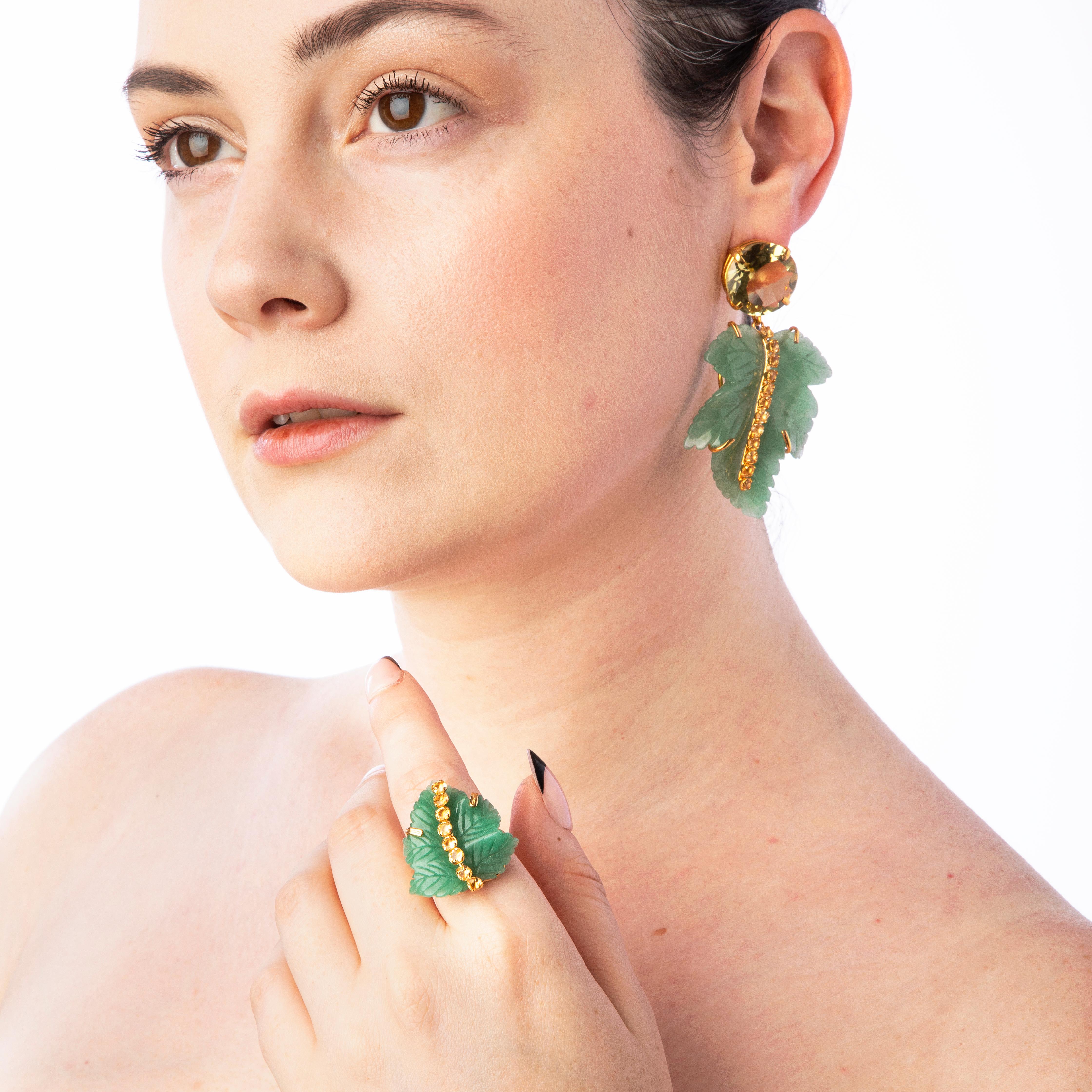 The Jasmine Earrings, crafted from semi-precious materials, feature a leaf design with a removable bottom, allowing for a versatile and simpler style. Inspired by vintage aesthetics.

SKU: ED-LF-90
Stones: Green Aventurine & Lemon Quartz
Material: