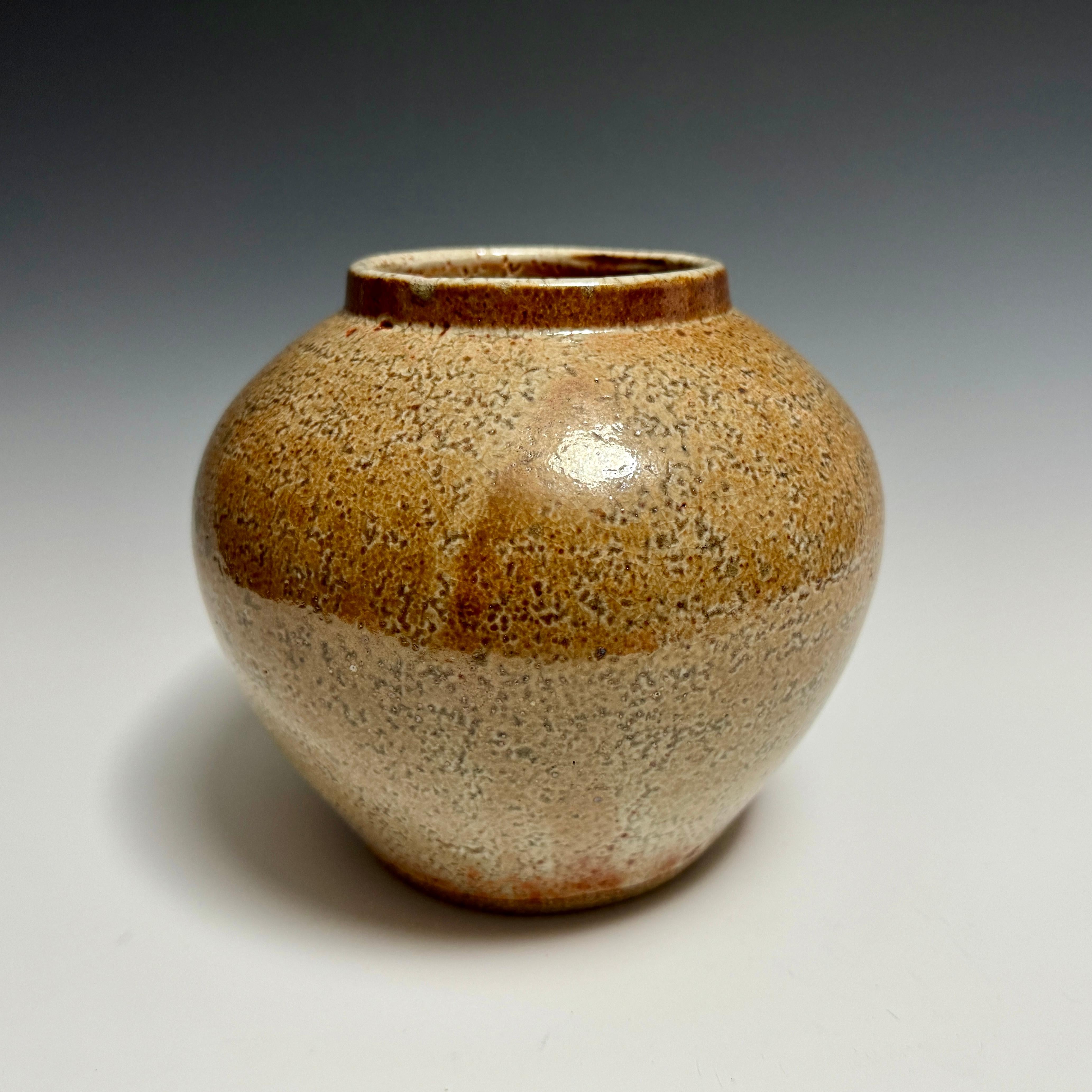 Contemporary Ceramic Shino Glazed Vessel by Jason Fox.

A Southern Californian for over half his life, Jason Fox draws upon his classical education in Architecture and Art History as well as his love of surfing and the ocean. He works organically