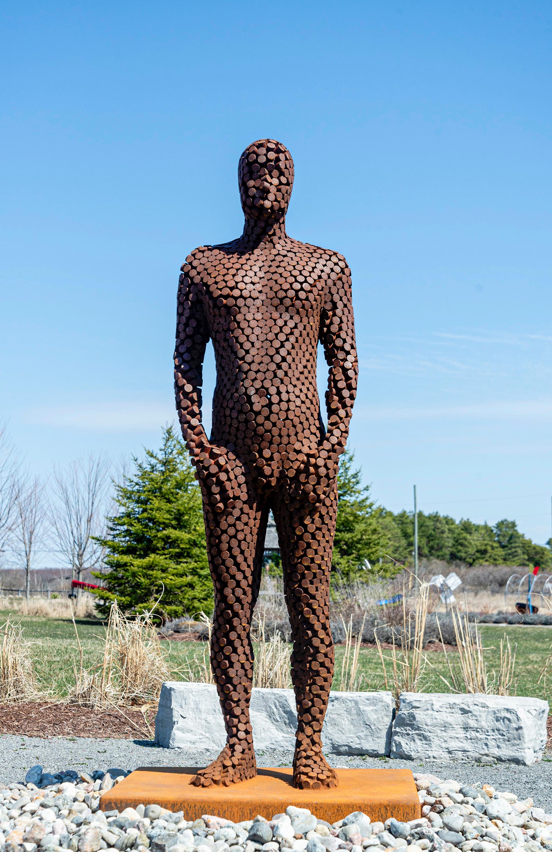 Jason Kimes Figurative Sculpture - Sentinel - large, rusted, male figure, Corten steel outdoor sculpture