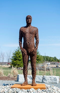 Sentinel - large, rusted, male figure, Corten steel outdoor sculpture
