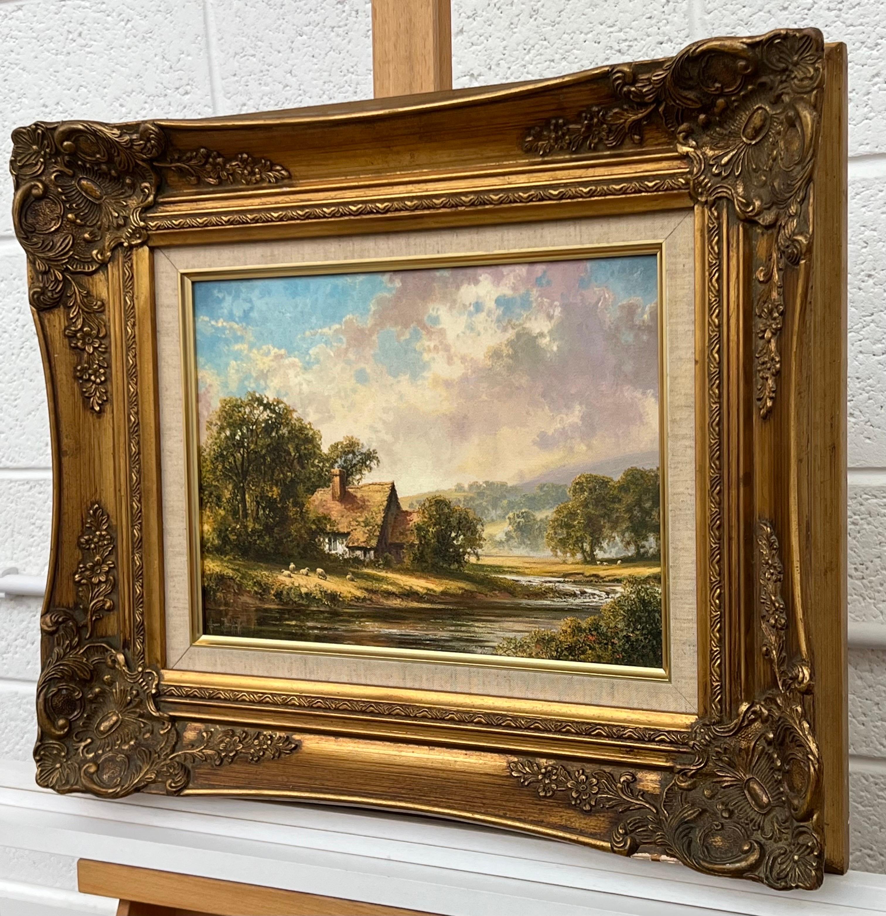 Idílica cabaña junto al río con ovejas en la campiña inglesa por un artista británico - Painting Realista de Jason Threlfall