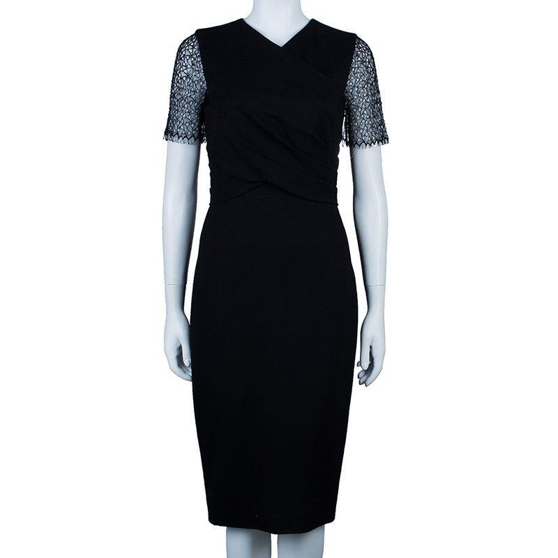 Black is always gorgeous. This amazing dress by Jason Wu would fit around you to lend a slimmer look. The wrap around pattern in the front looks splendid. The sheer short sleeves are further beautified with black lace detailing. Slide into this