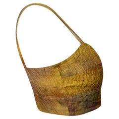Top corto in cotone giallo con effetto crinkle, memory e tie-dye della collezione Jason Wu