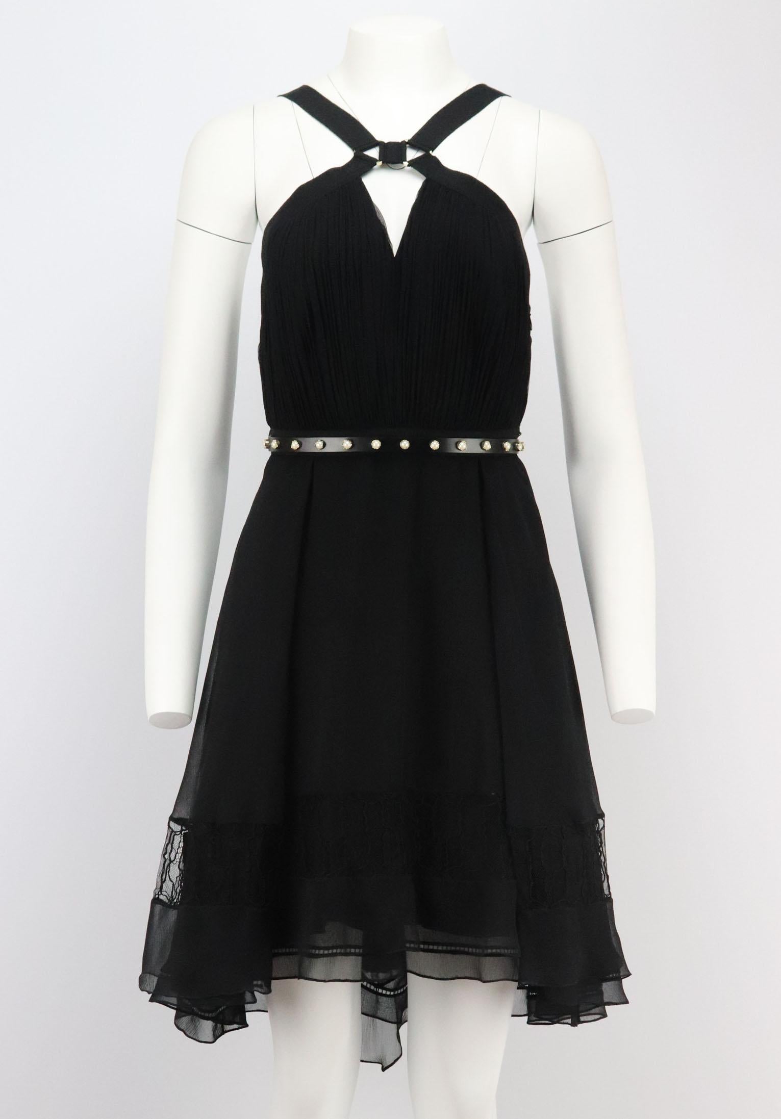 This Jason Wu dress is the perfect blend of elegance and edge-layers of lightweight silk-chiffon spliced with lace are contrasted with an edgy harness-inspired neckline and wide adjustable straps.
Black semi-sheer silk-chiffon.
Zip and hook