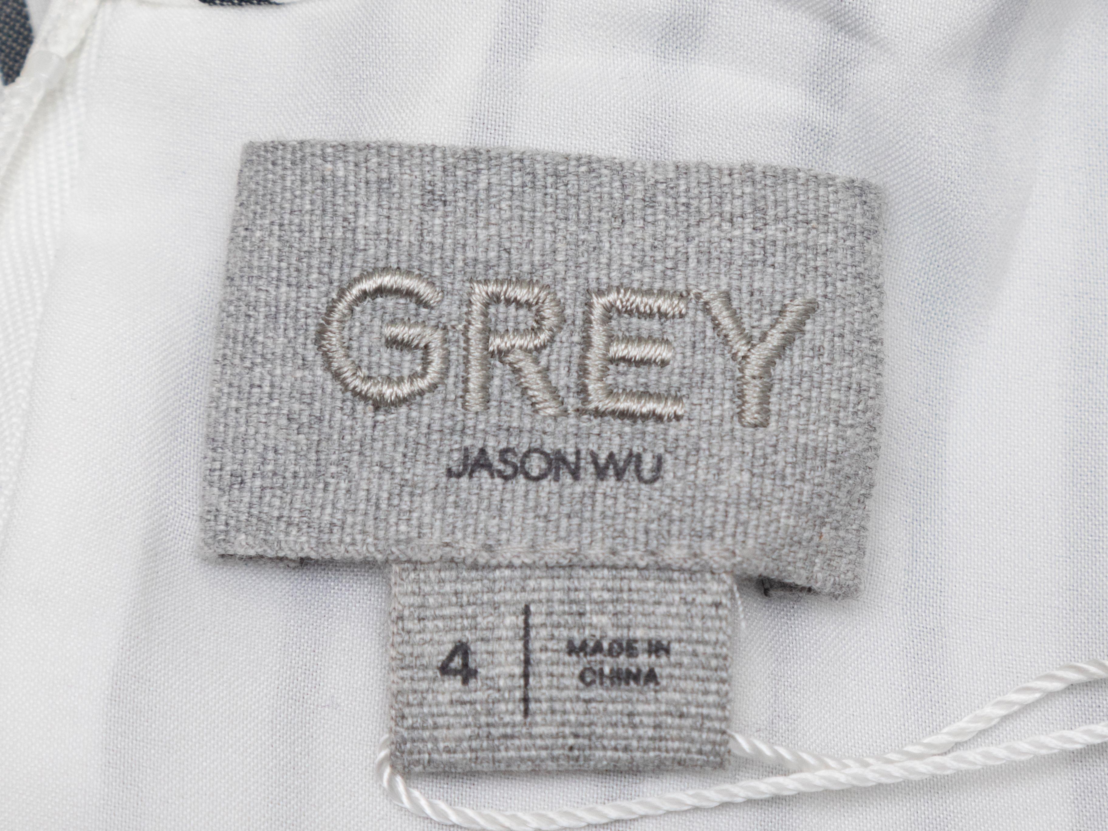 Product Details: Grey and white striped sleeveless romper by Grey by Jason Wu. Crew neckline. Dual hip pockets. Sash tie at back of waist. Zip closure at back. 35